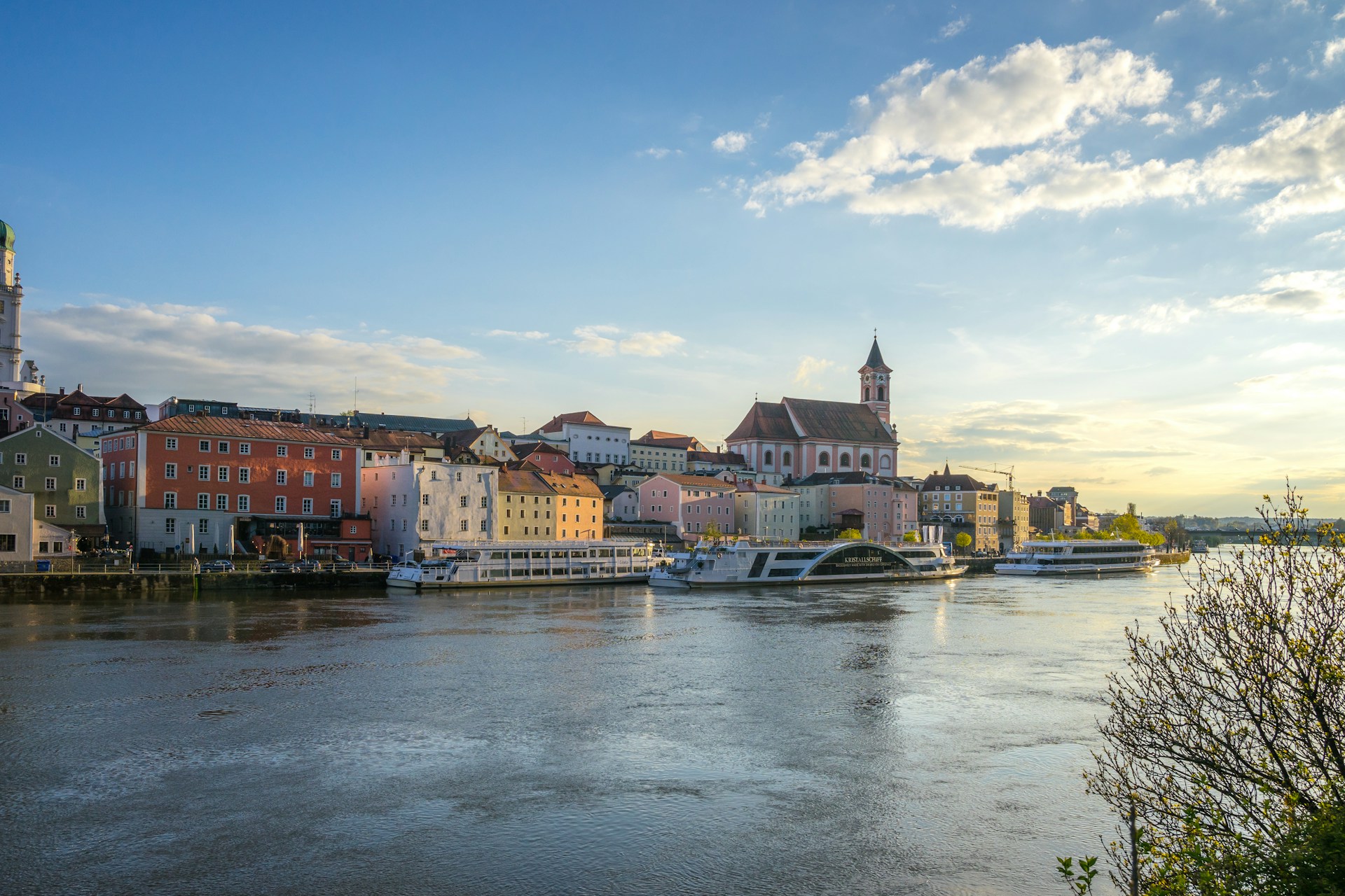 Photo by Unsplash An illustrative photo of a river with boats in it near a coast with houses
