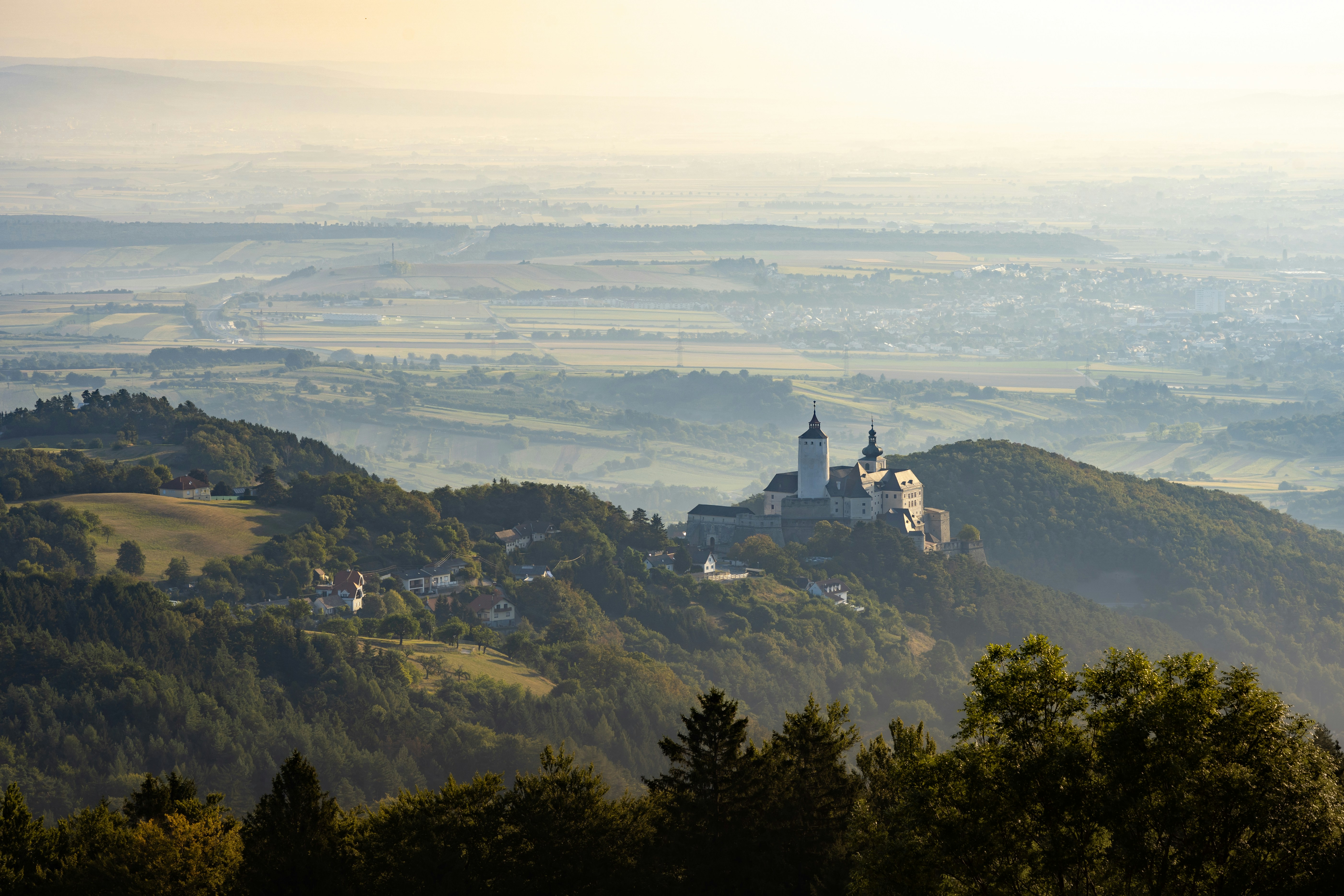 An illustrative photo of a castle on top of a hill in Austria