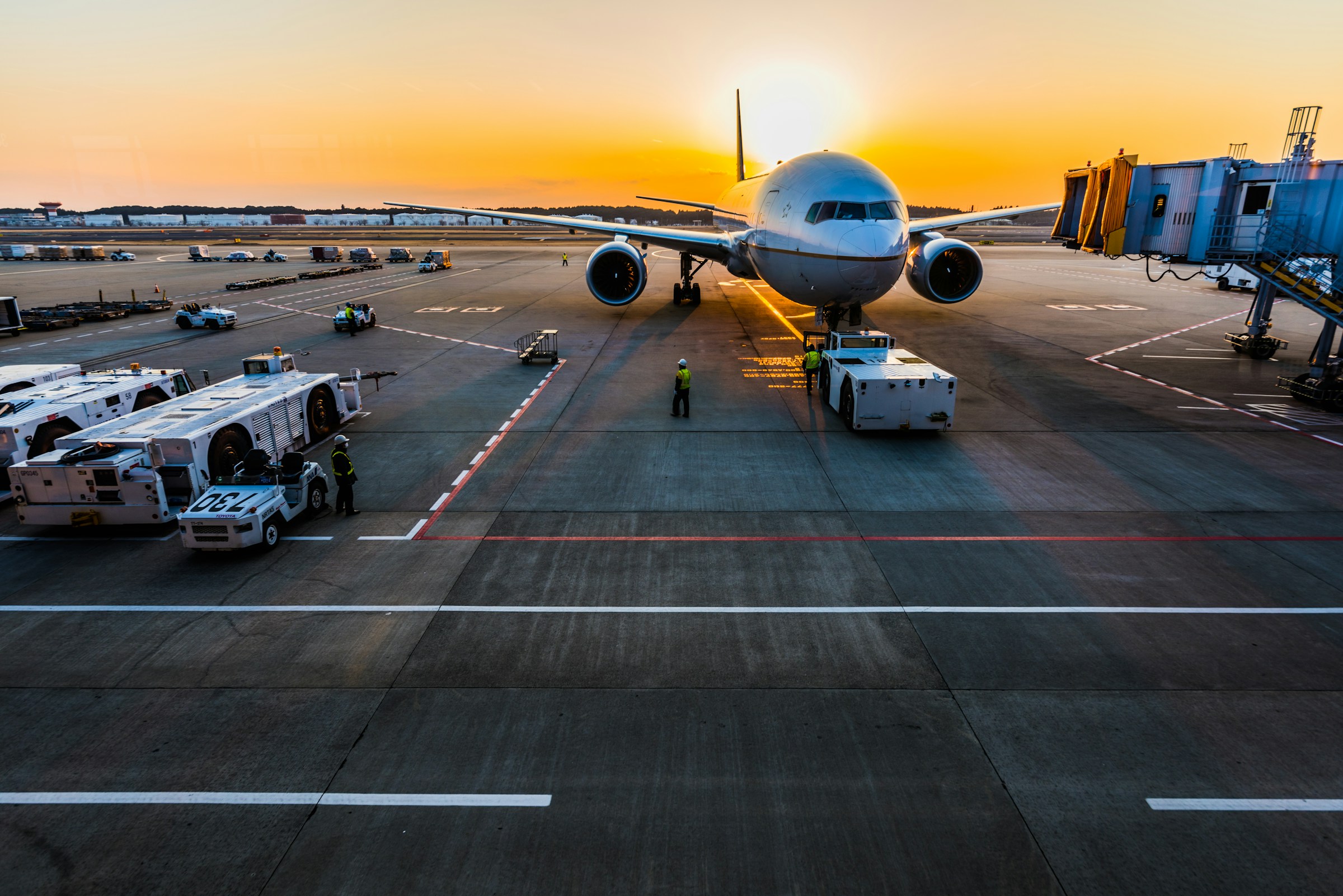 An illustrative photo of a gray airplane on parking.