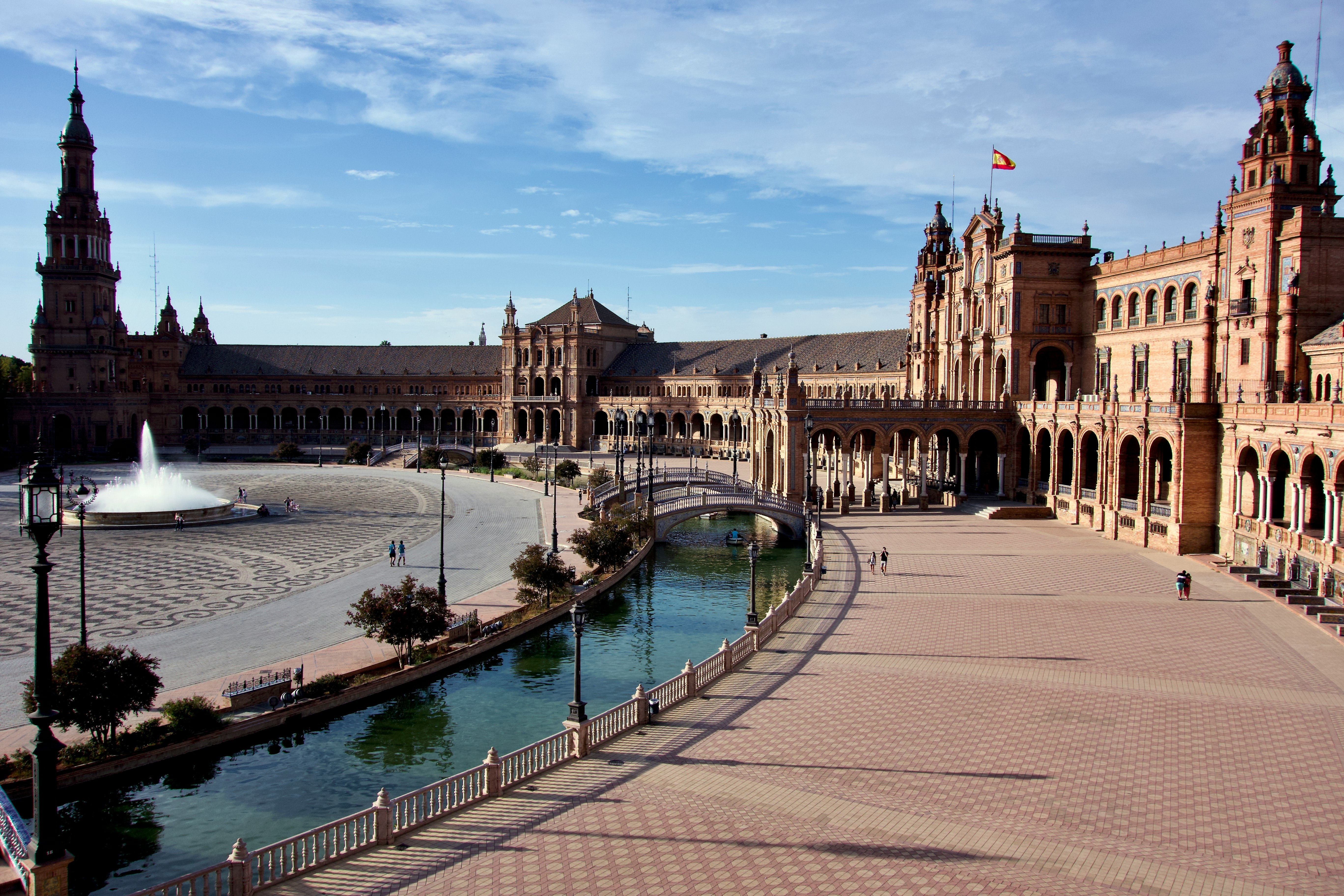Photo by Unsplash An illustrative photo of a square with fountain in Seville, Spain