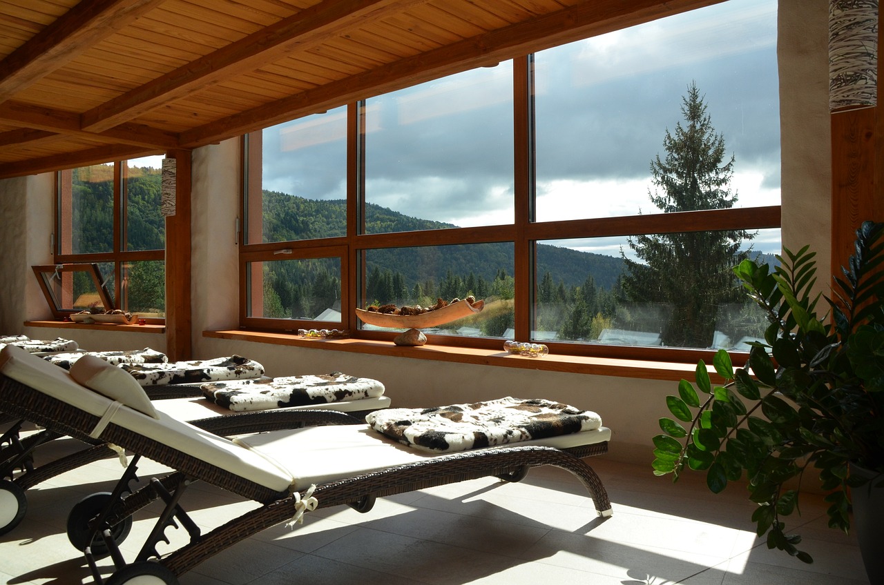 An illustrative photo of a spa room with a view of the mountains