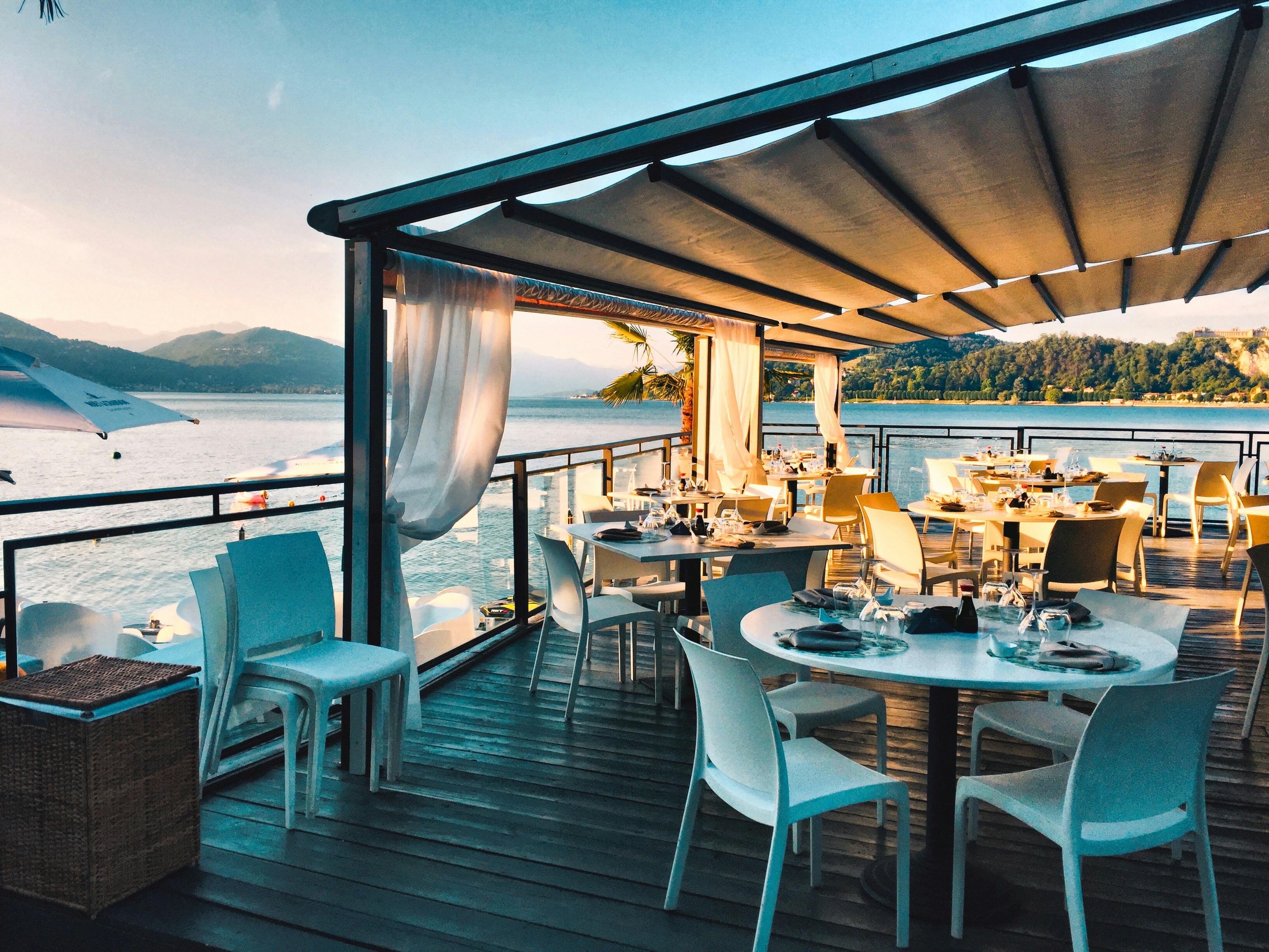 Photo by Unsplash An illustrative photo of a restaurant with a view of the water.