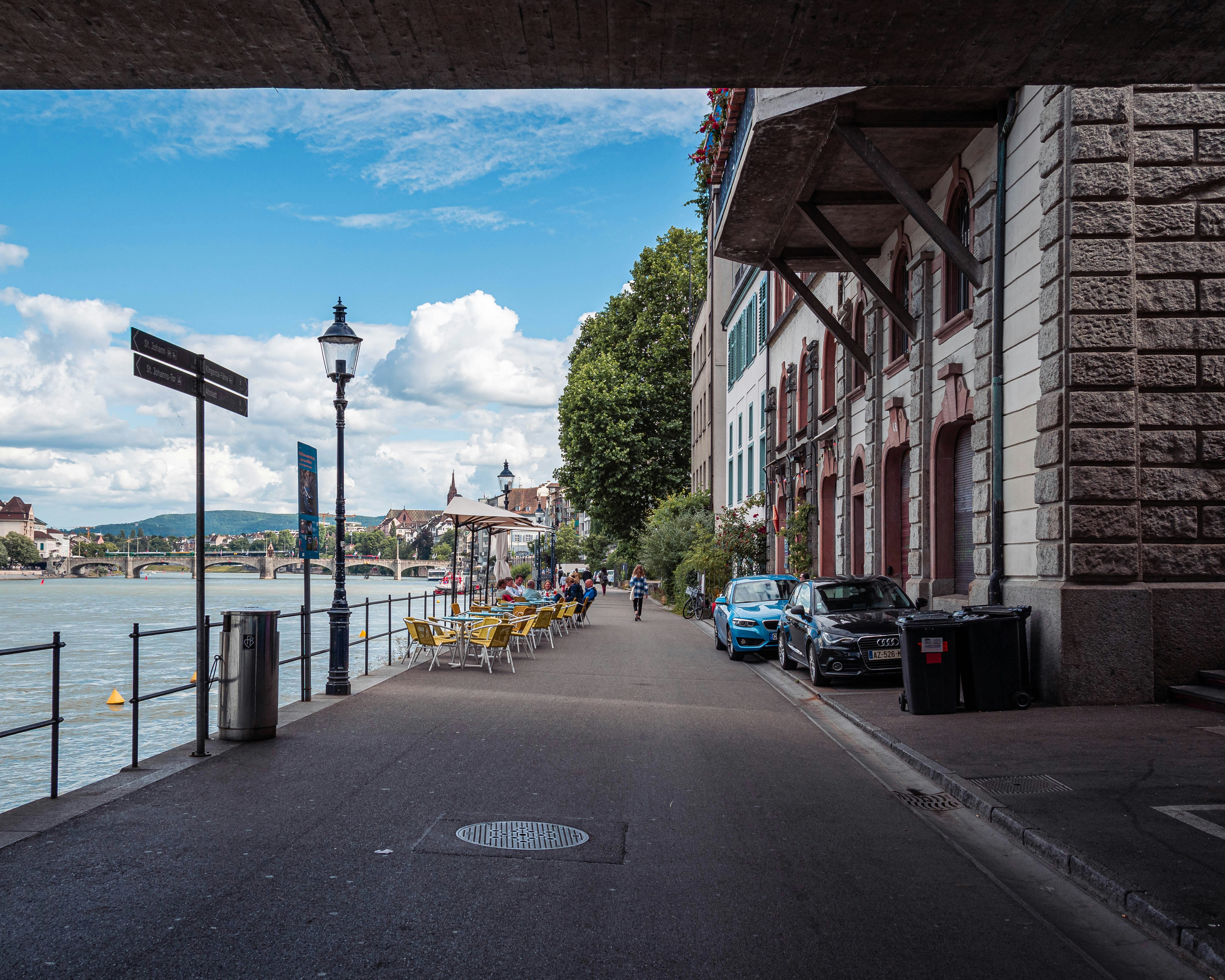 An illustrative photo of a street with cars.