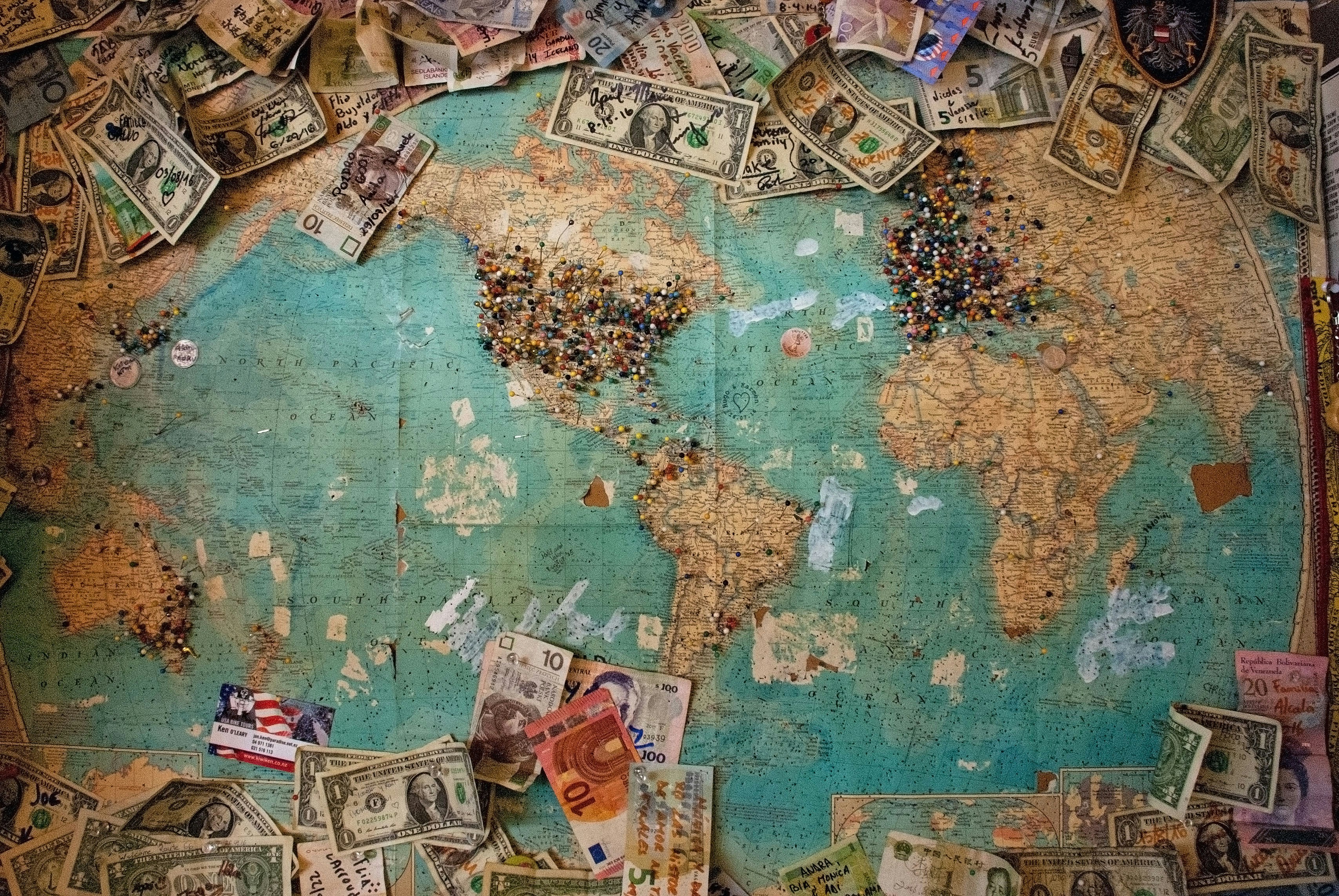 An illustrative photo of a dollar banknote with map
