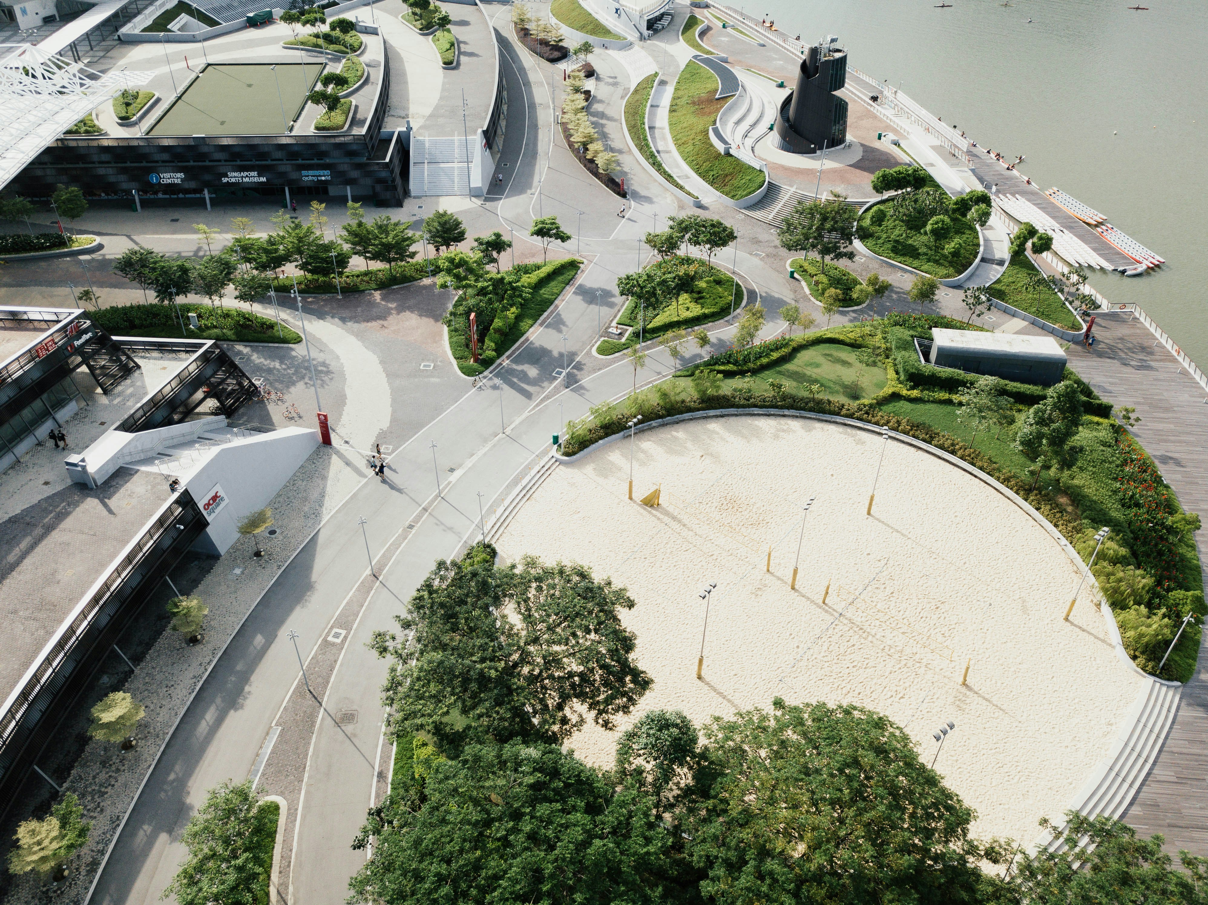 Photo by Unsplash An illustrative photo of a park near road beside a body of water