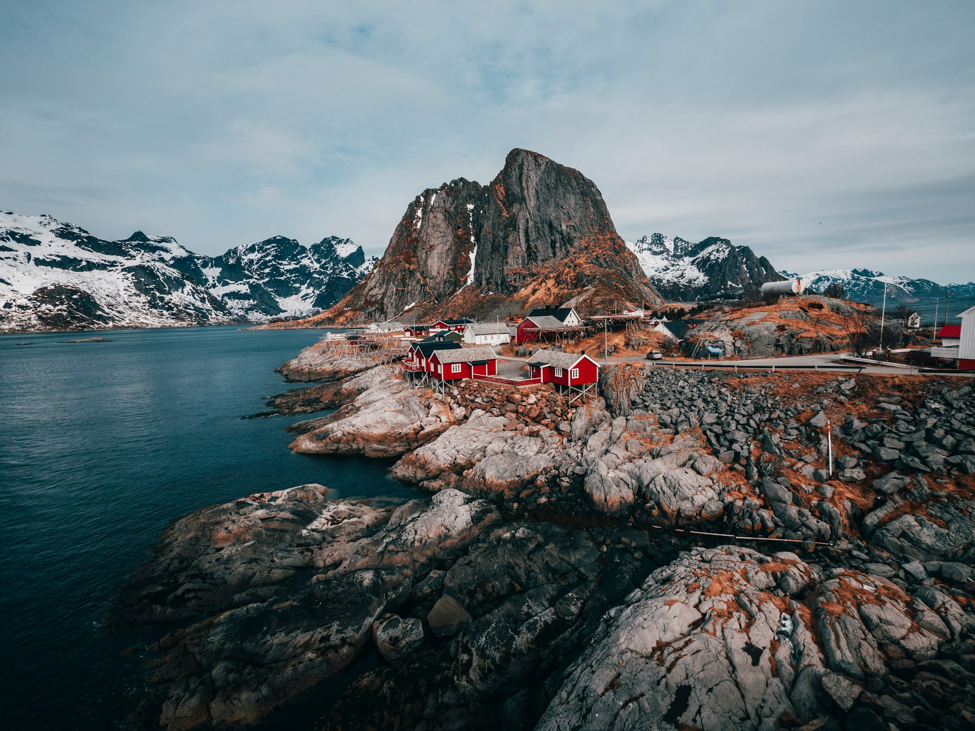 An illustrative photo of a rock formation near a body of water