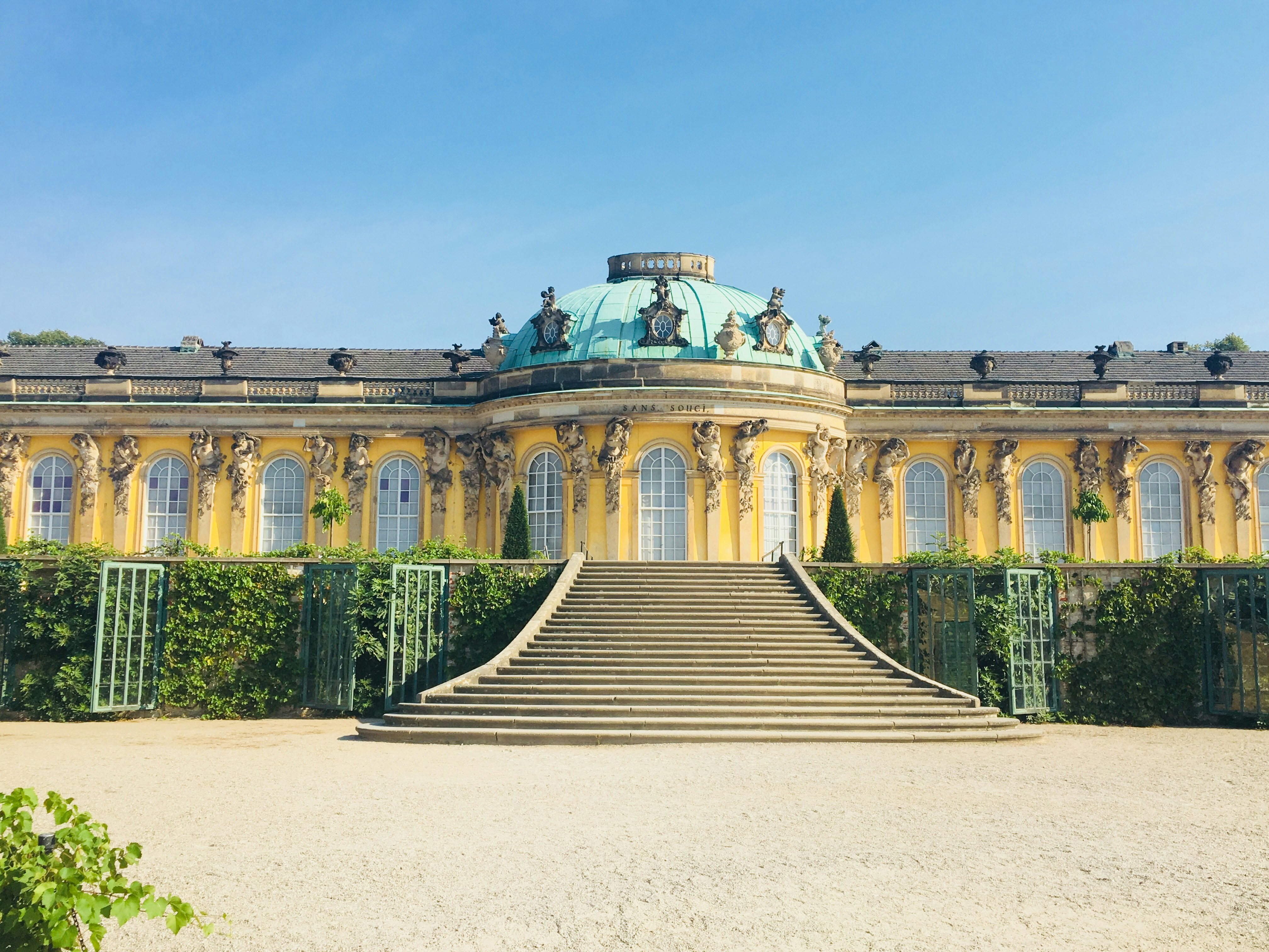 An illustrative photo of a yellow palace in Germany