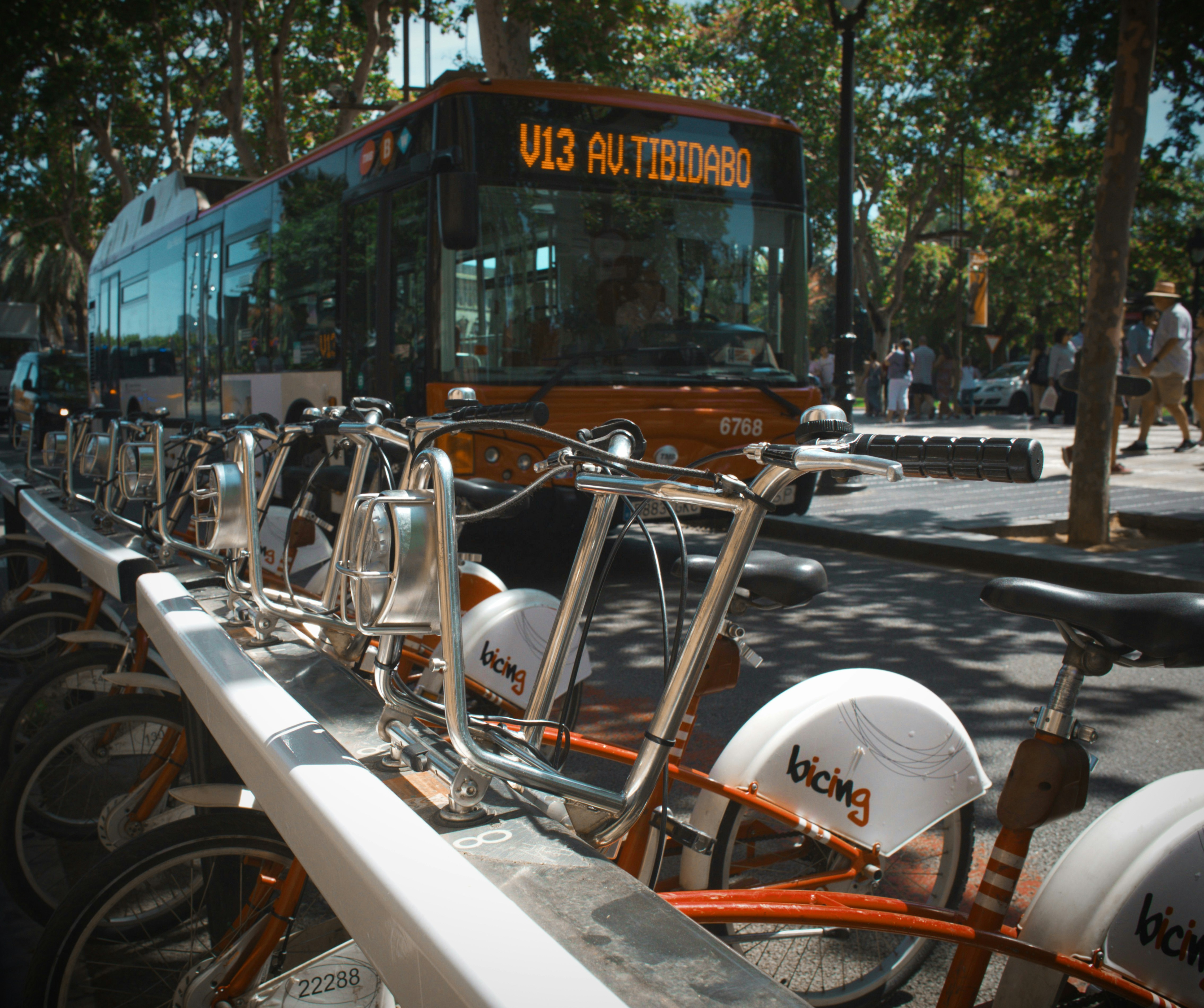 An illustrative photo of a bus near bikes.