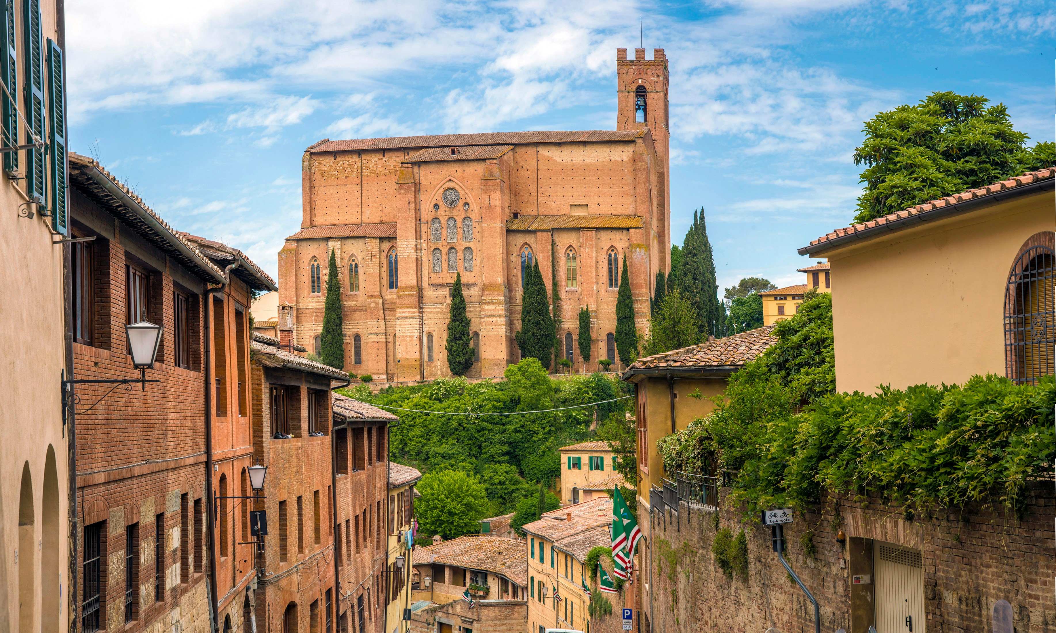 An illustrative photo of buildings in Siena, Italy