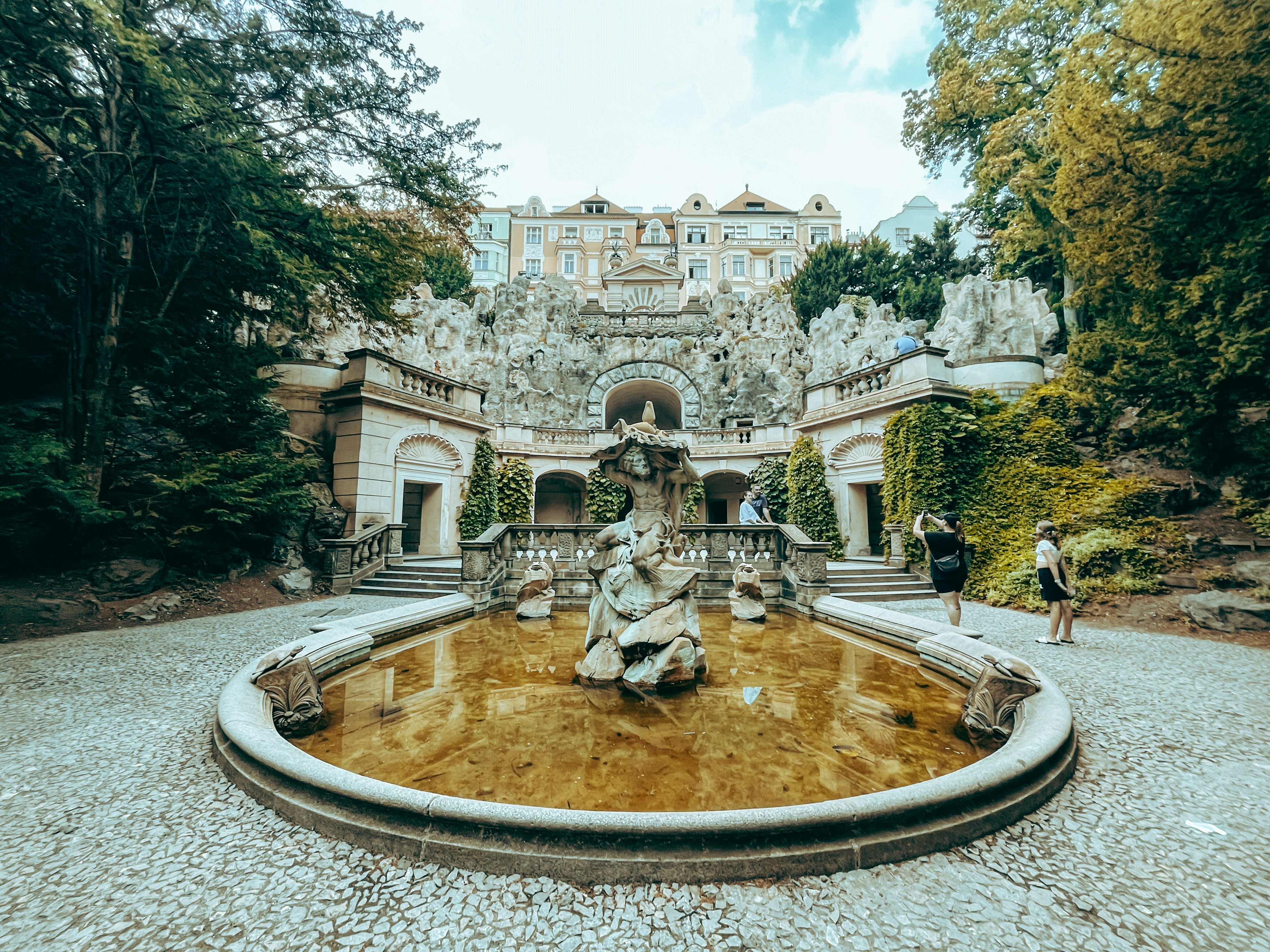 An illustrative photo of a fountain in the middle of a park