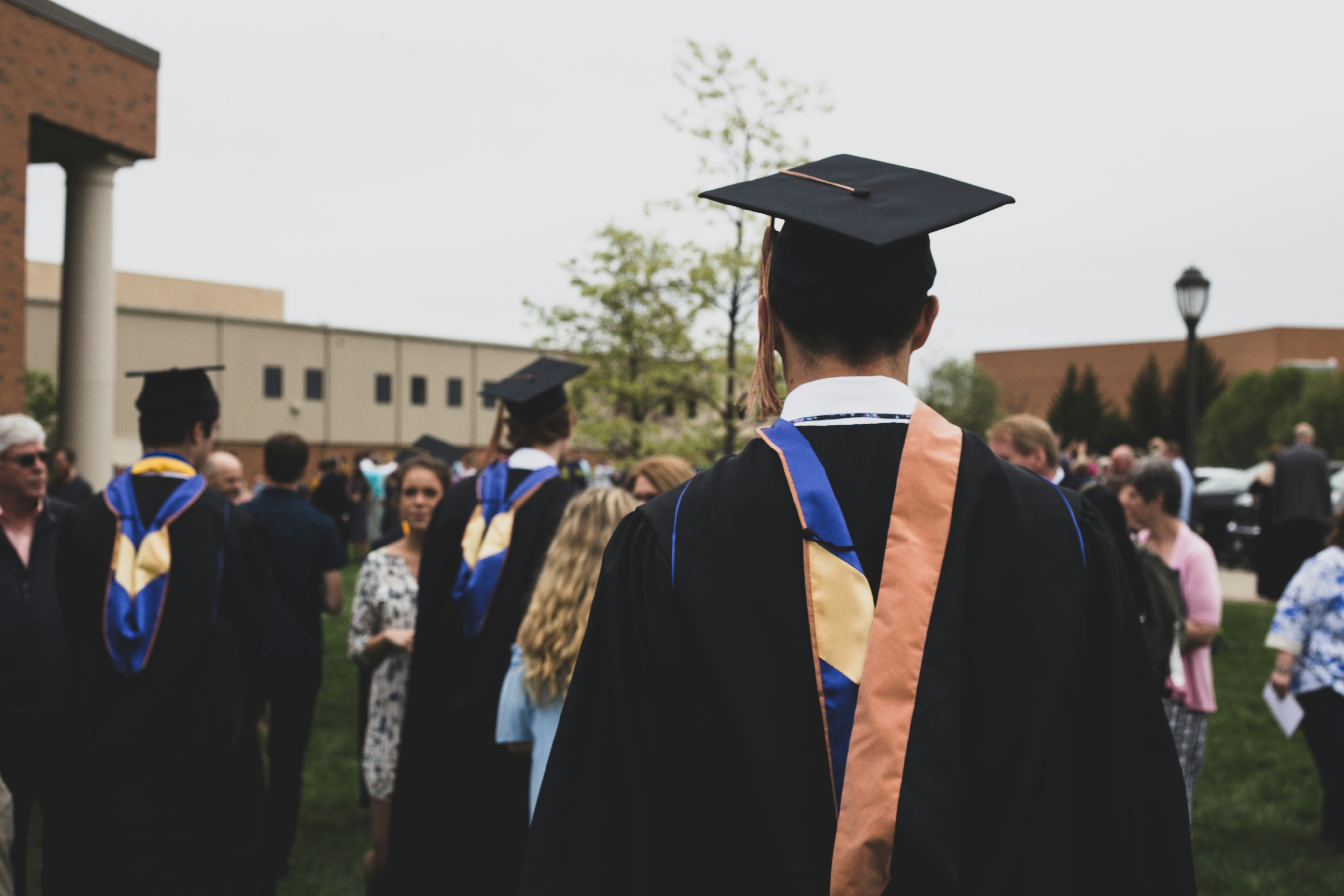 An illustrative photo of people in academic gowns.