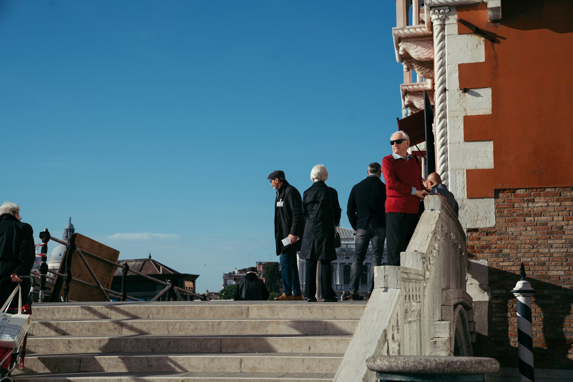 An illustrative photo of people walking on stairs during daytime