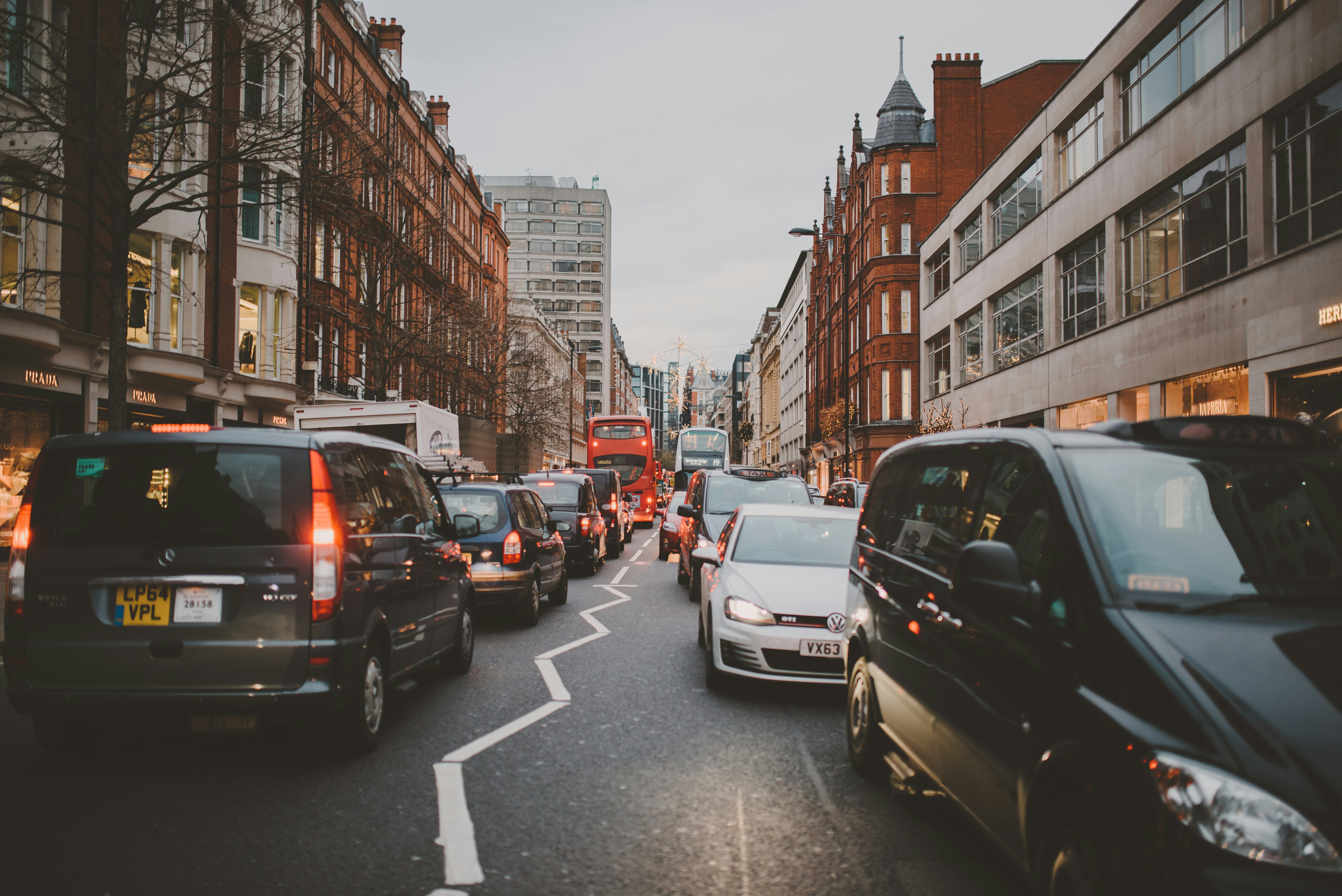 Photo by Unsplash An illustrative photo of wide road with vehicles