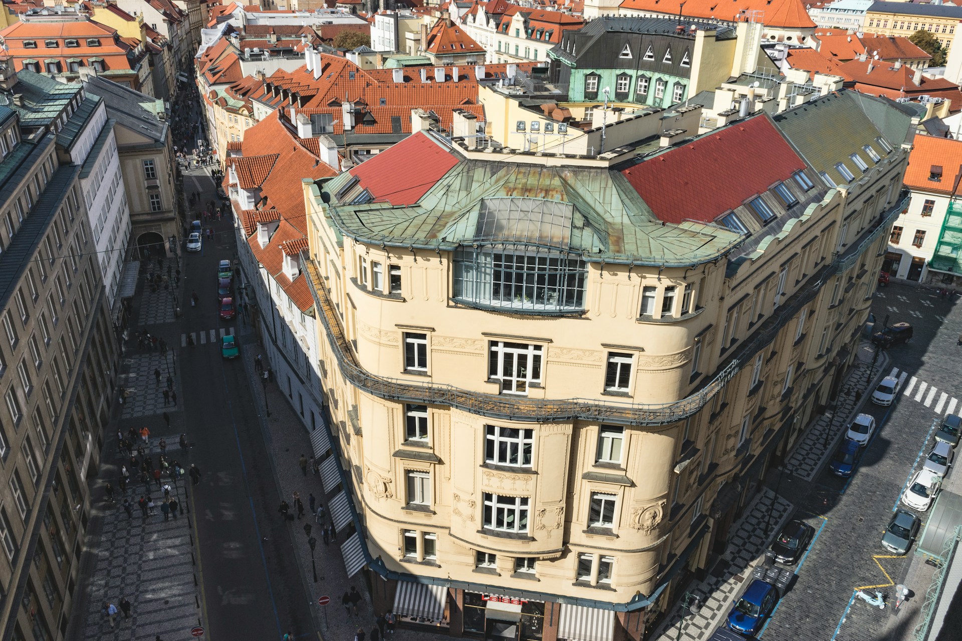 An illustrative photo of a building in Prague between two roads