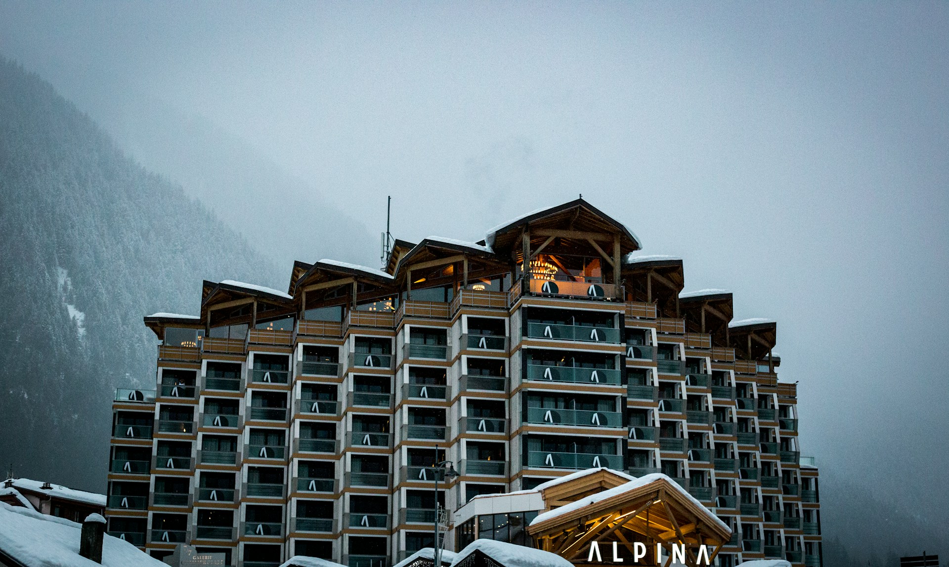 An illustrative photo of a modern hotel in the mountains