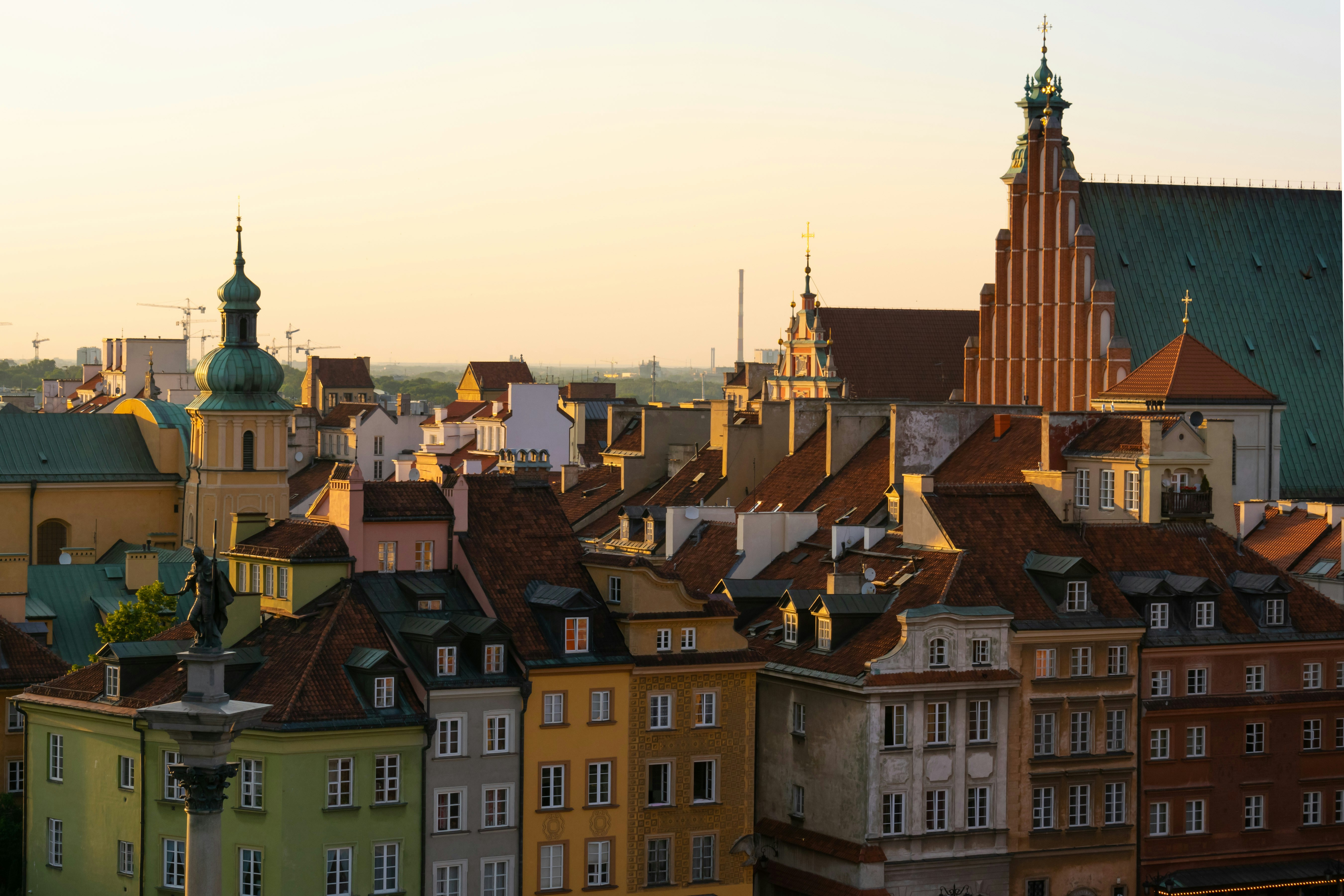 An illustrative photo of colourful buildings in the old town of Warsaw