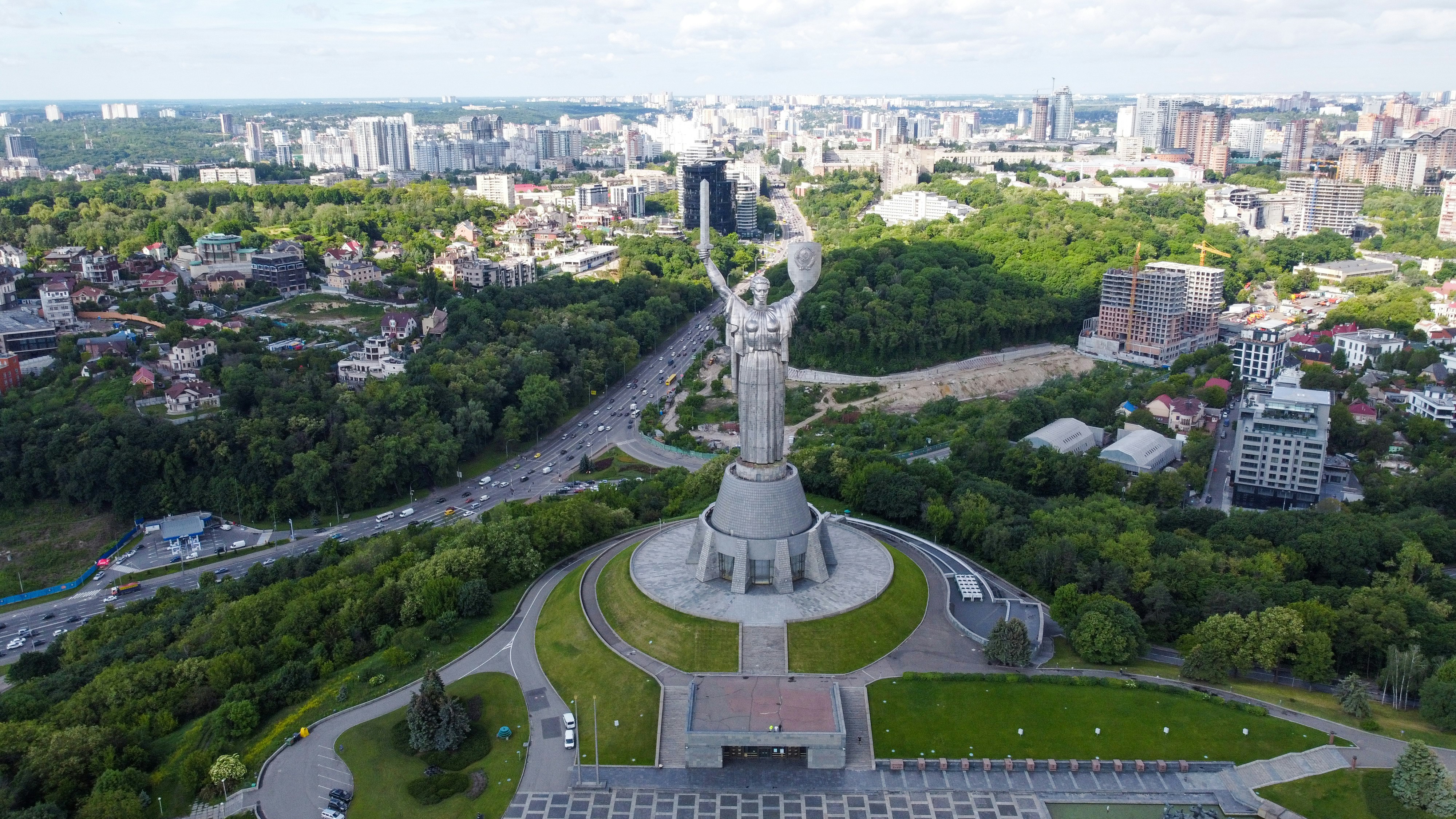 Photo by Unsplash An illustrative photo of a statue in Kyiv with a view of a city in the background.