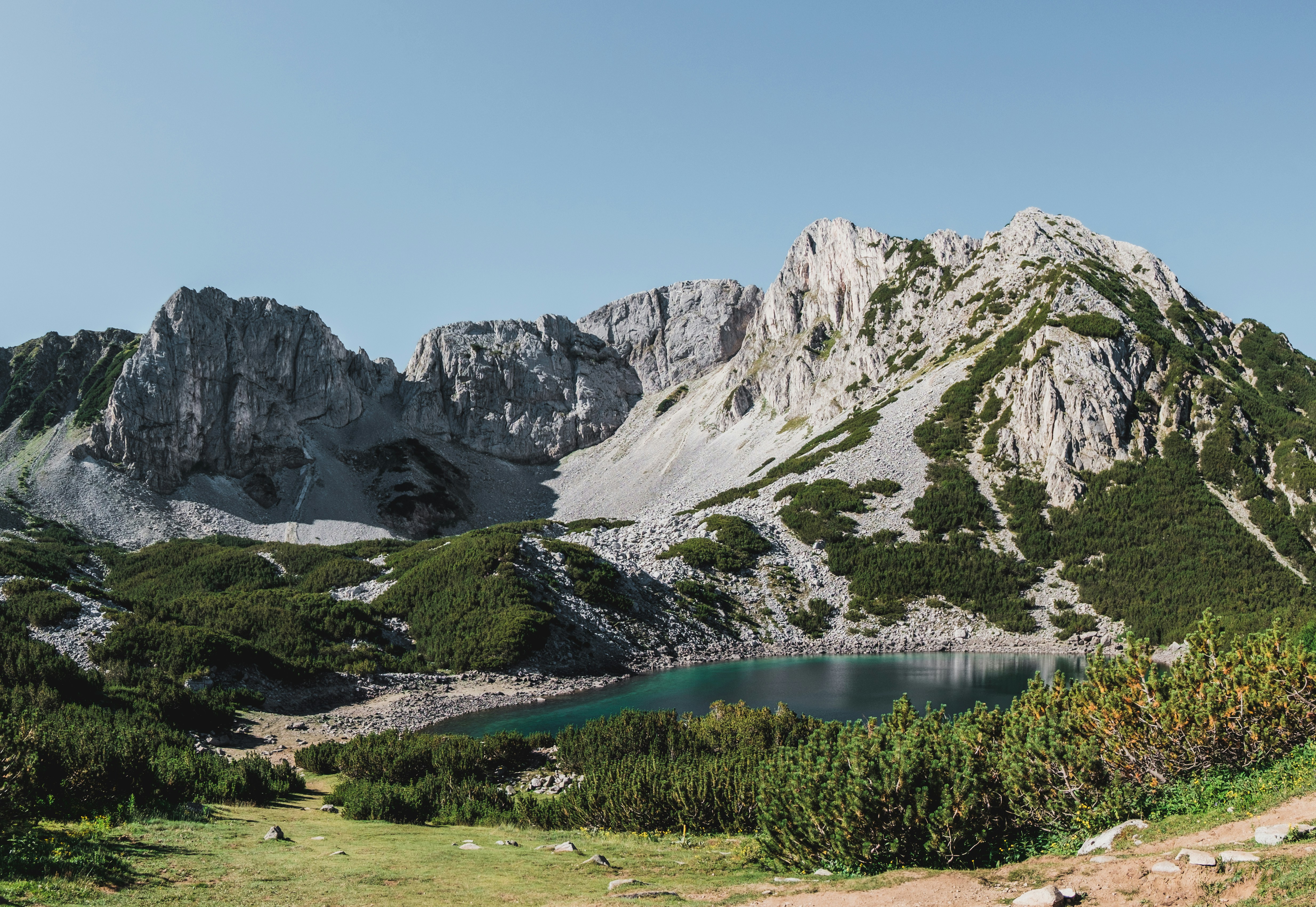 Photo by Unsplash An illustrative photo of a lake between mountains