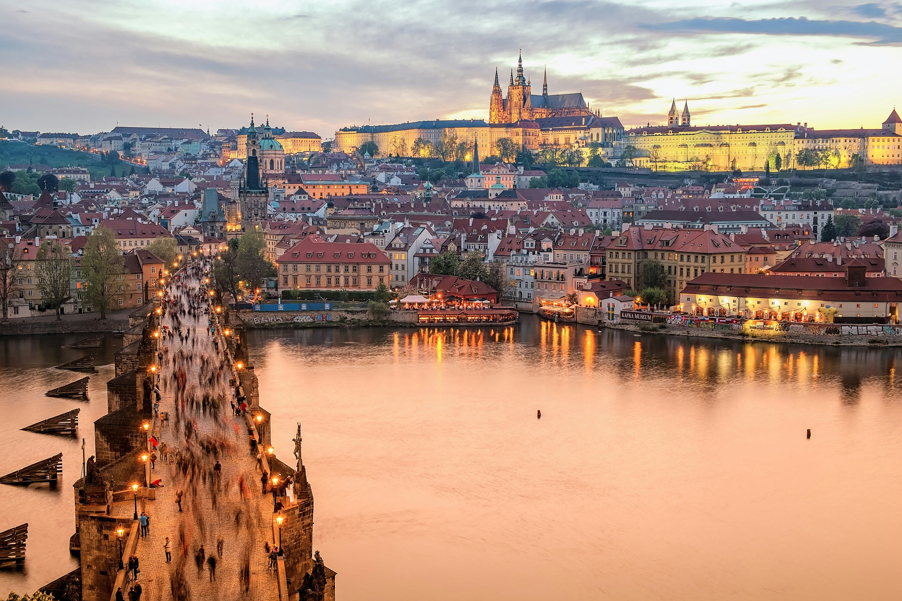 Photo by Unsplash An illustrative photo of people walking on a bridge over a river