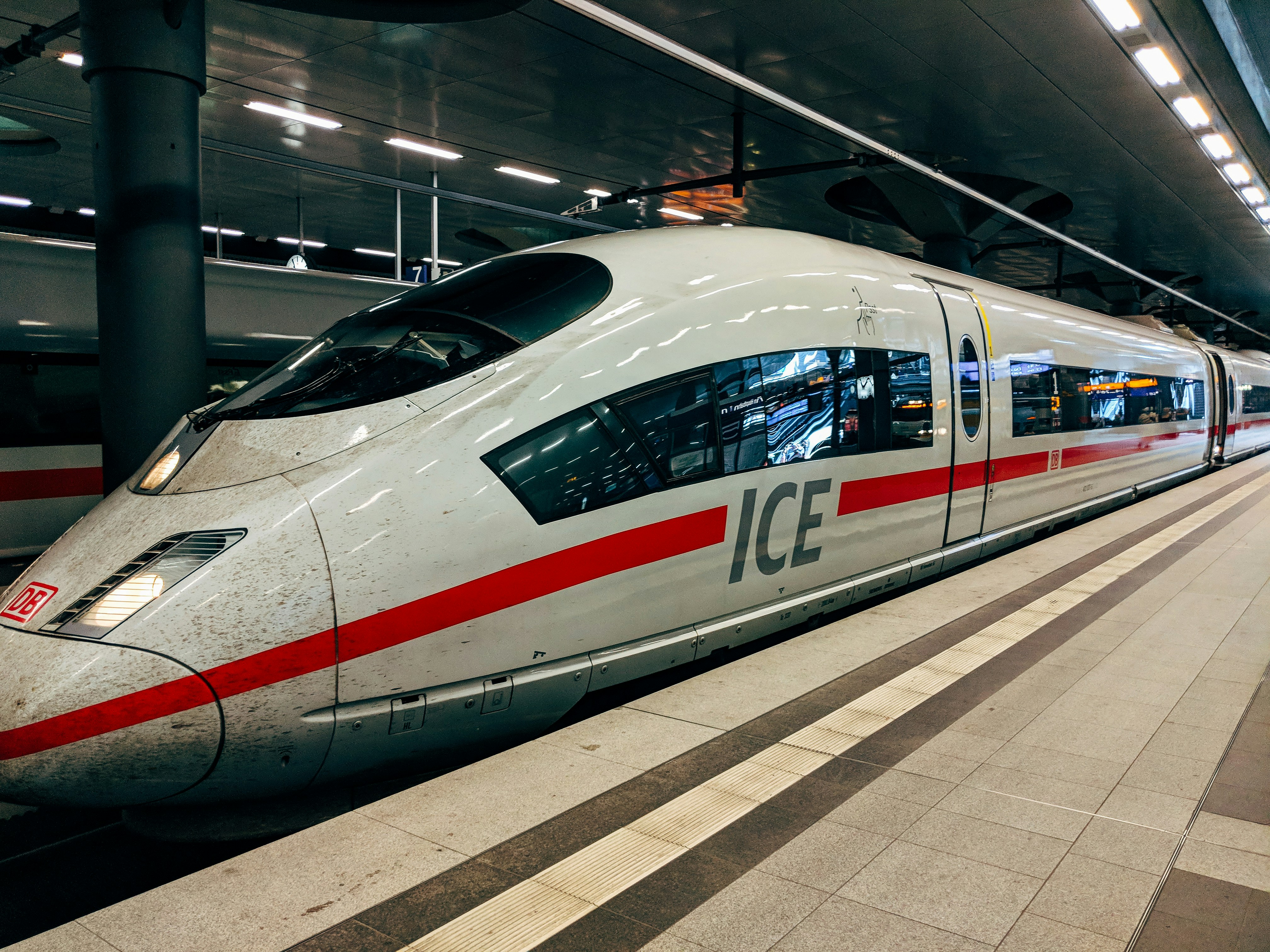 An illustrative photo of a high-speed train on a train station.