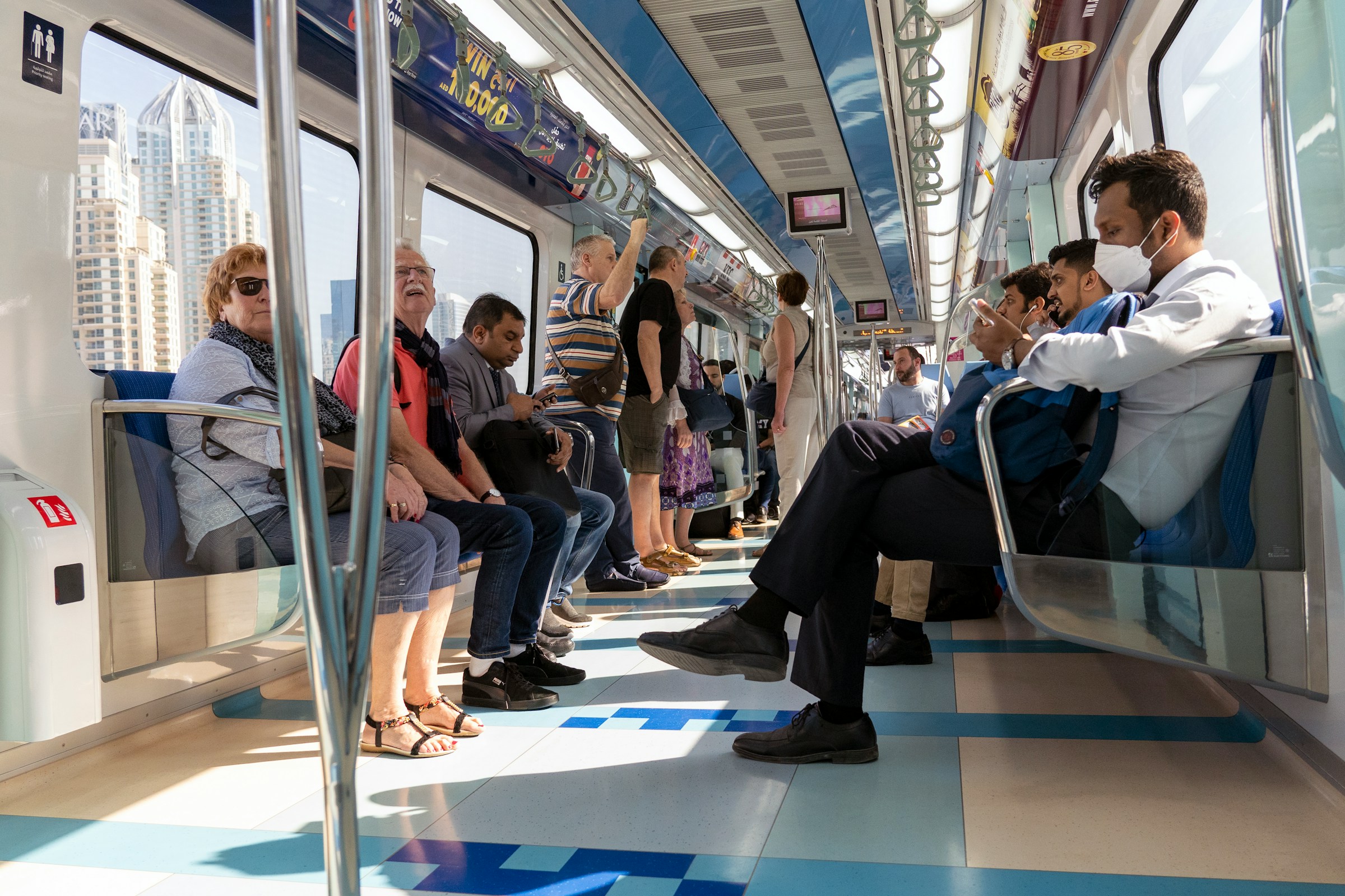 An illustrative photo of people sitting on a train.