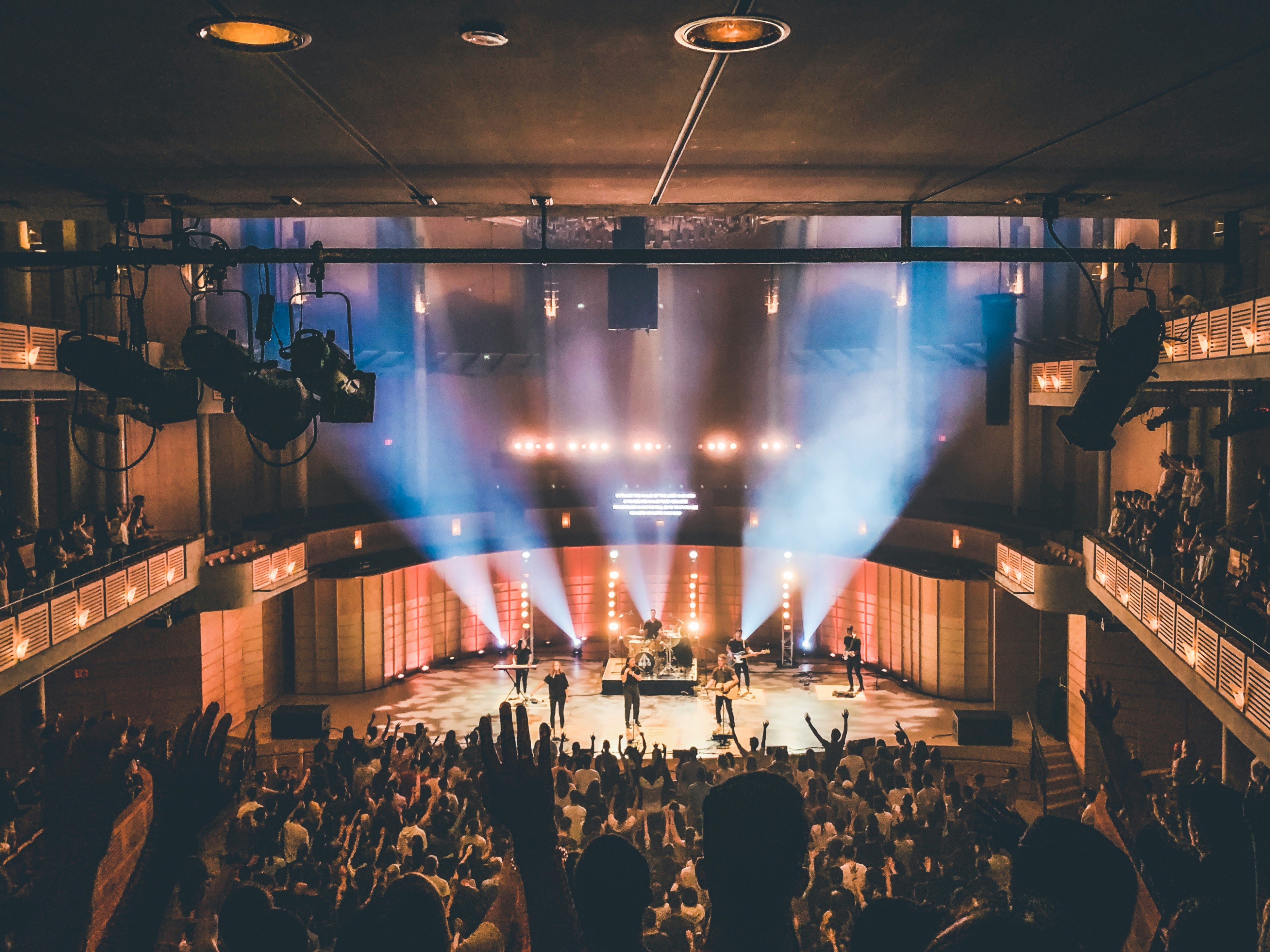 An illustrative photo of people standing on stage.