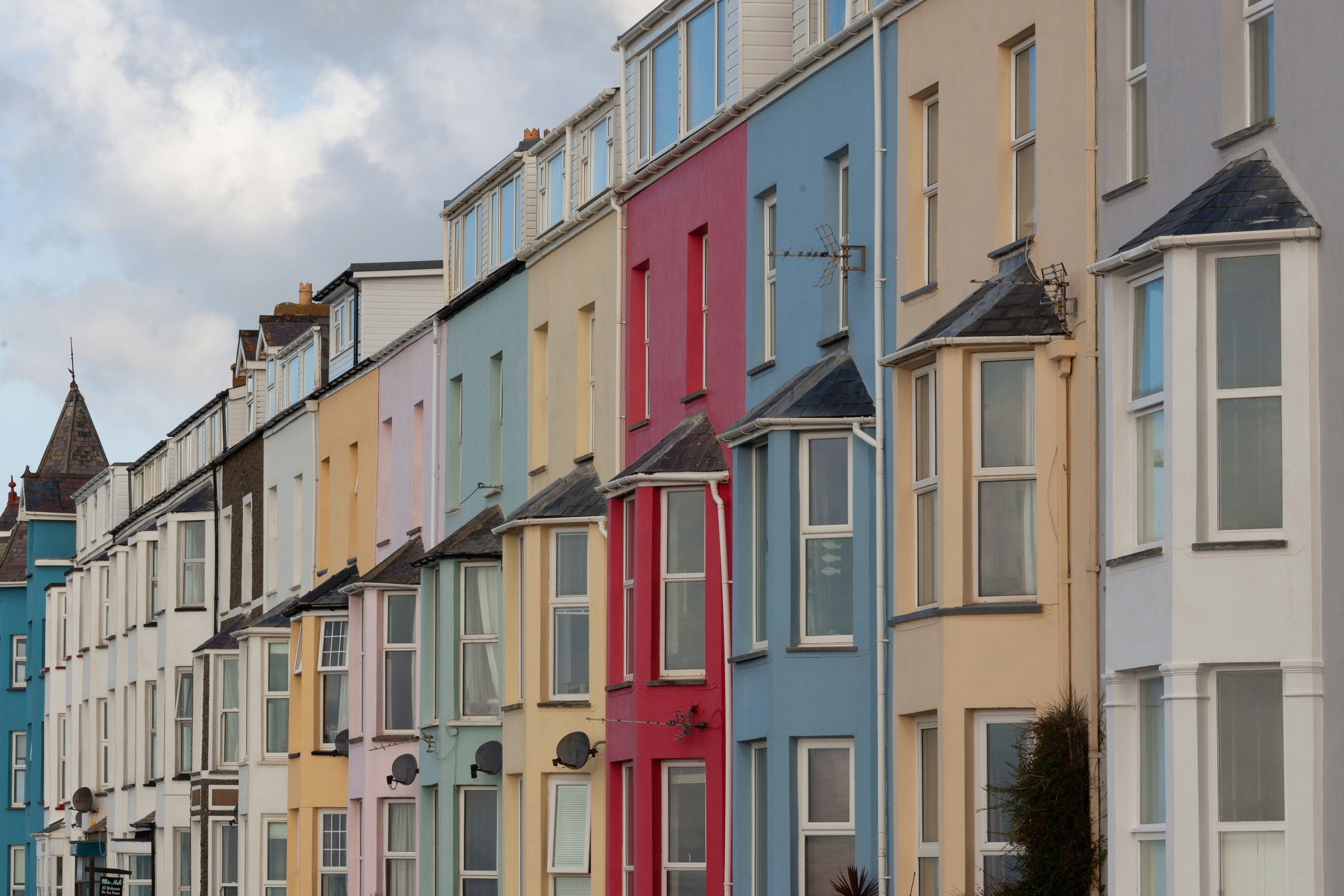 An illustrative photo of buildings of different colours.