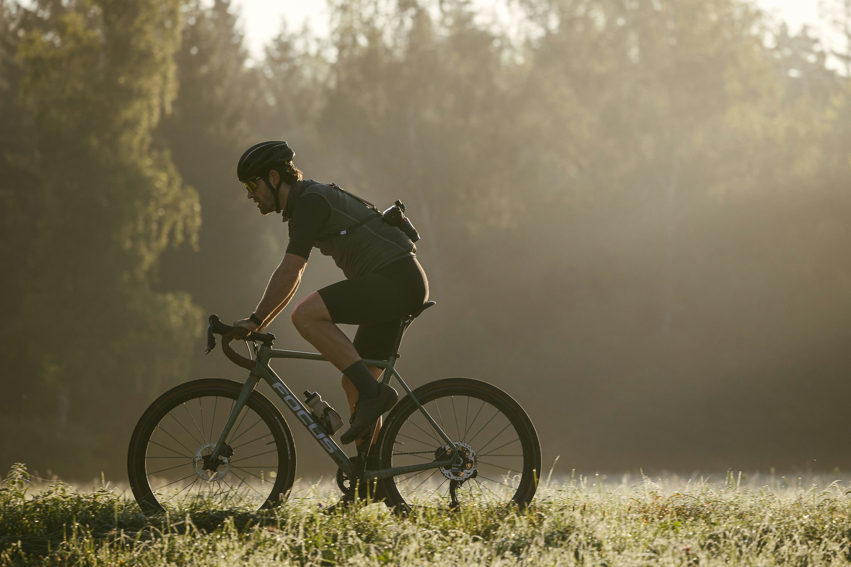Image by Unsplash An illustartive photo of a man riding a bike.