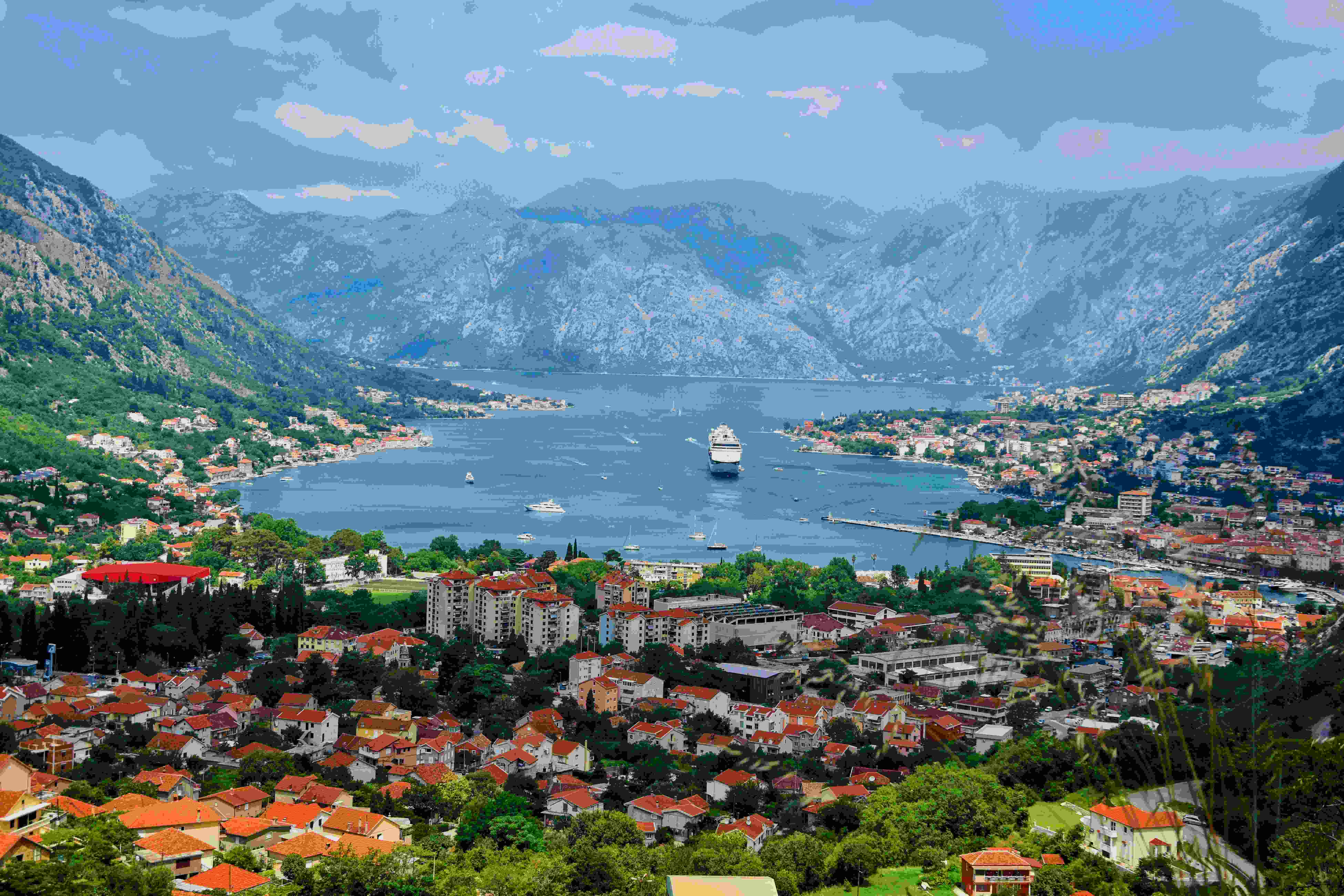 Image by Unsplash An illustrative photo of a city near a body of water during daytime.