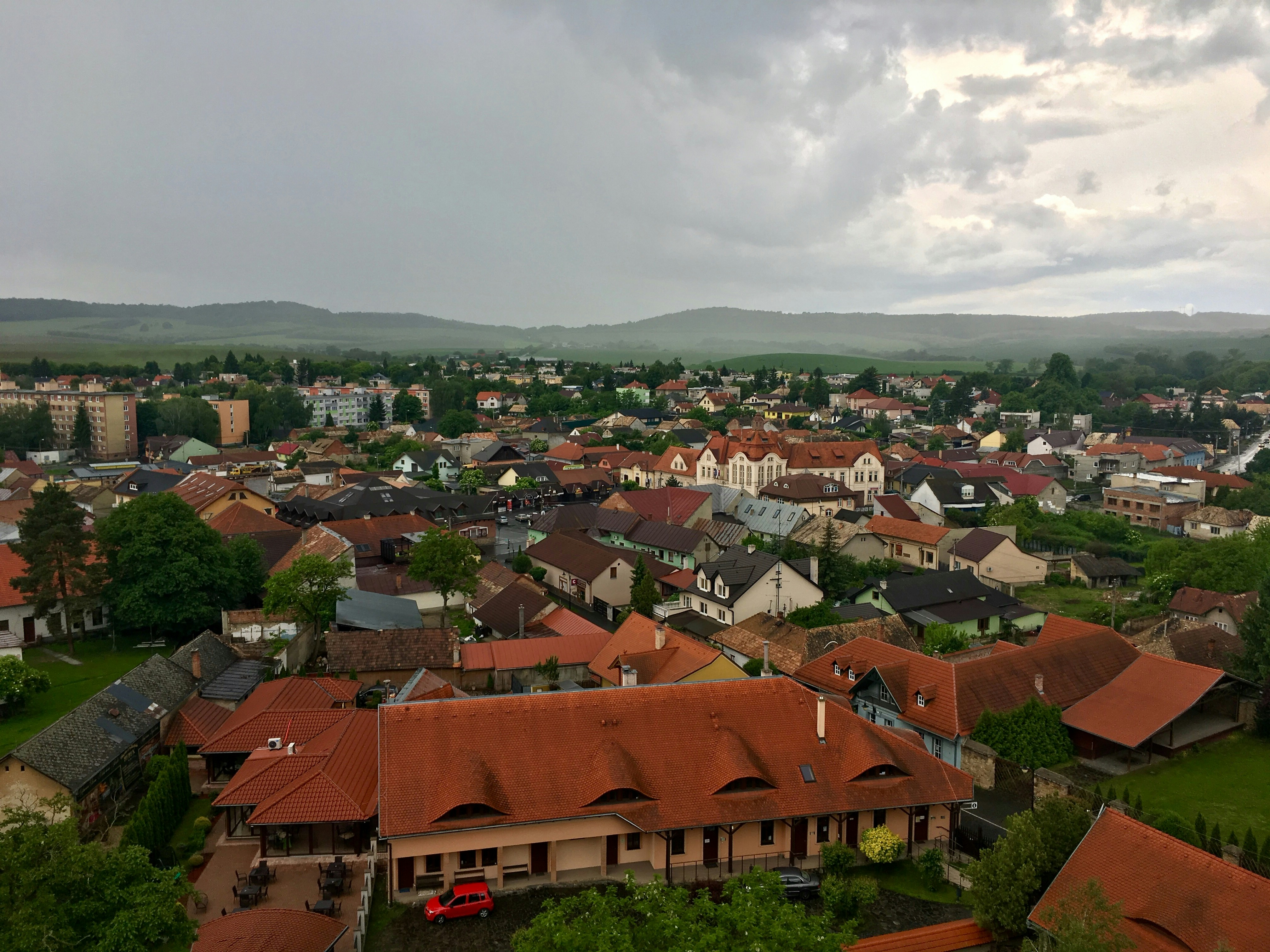 Image by Unsplash An illustrative photo of a city with red roofs.