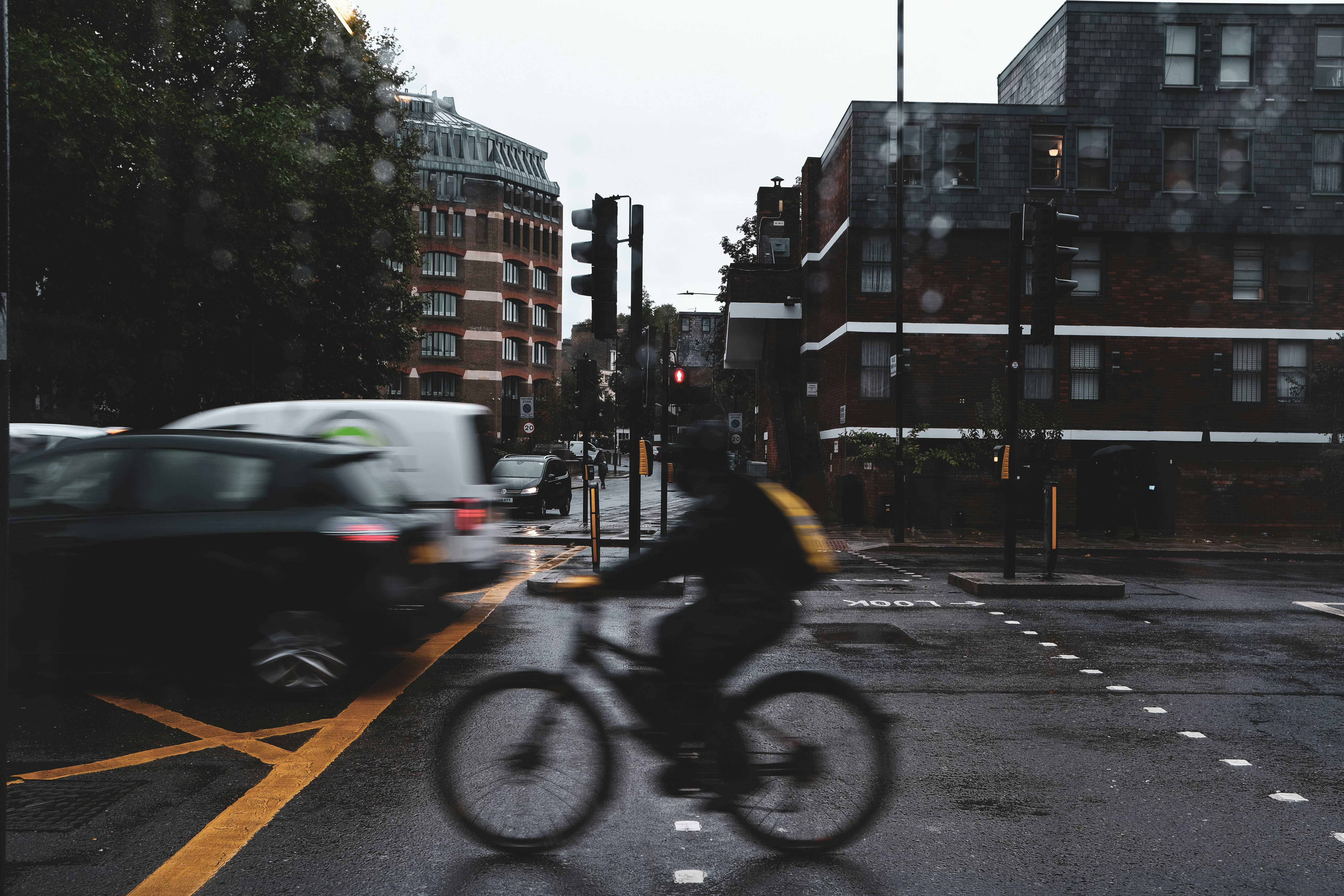 Photo by Unsplash An illustrative photo of a person riding a bike on a city street.