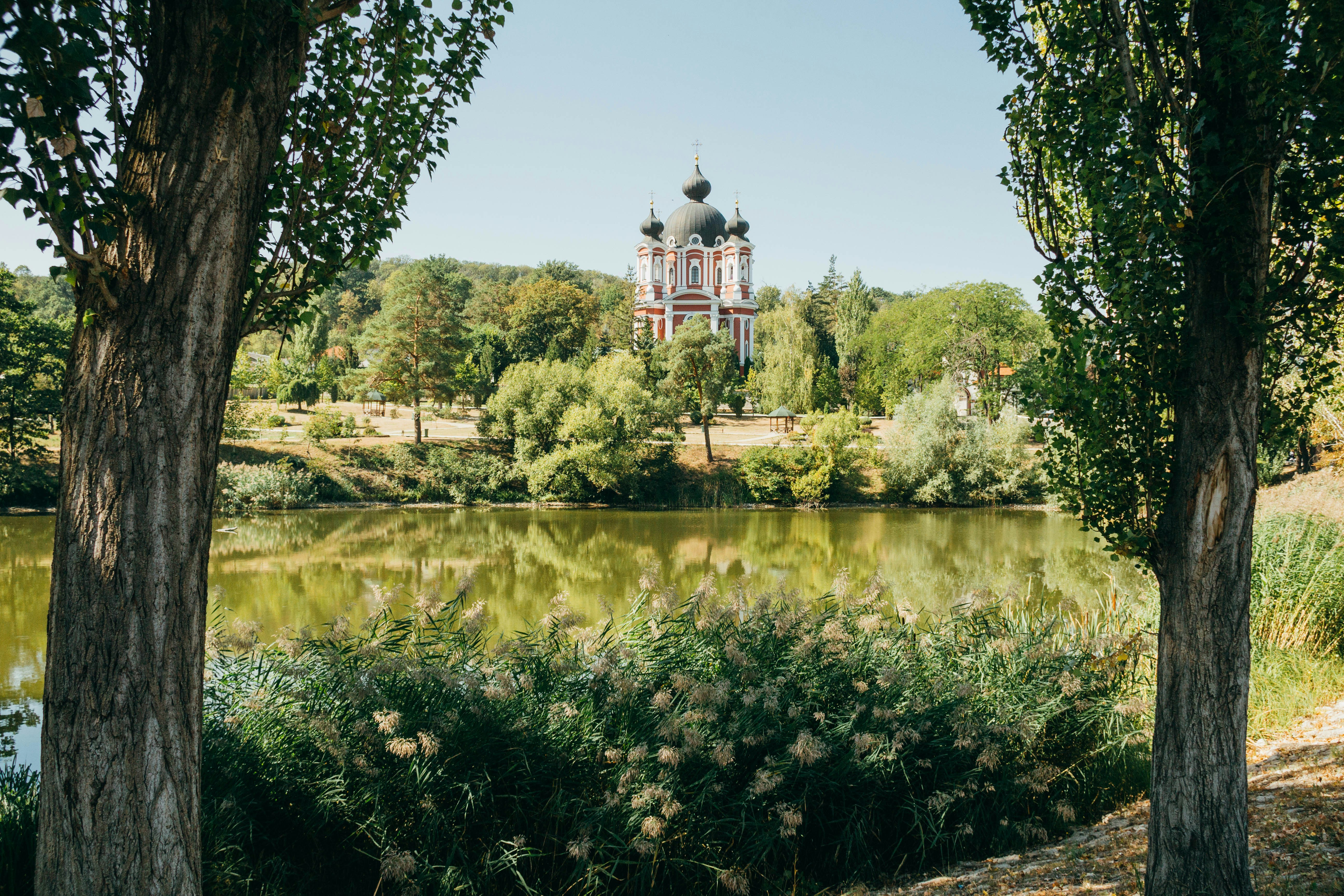 Photo by Unsplash An illustrative photo of a church near a body of water.