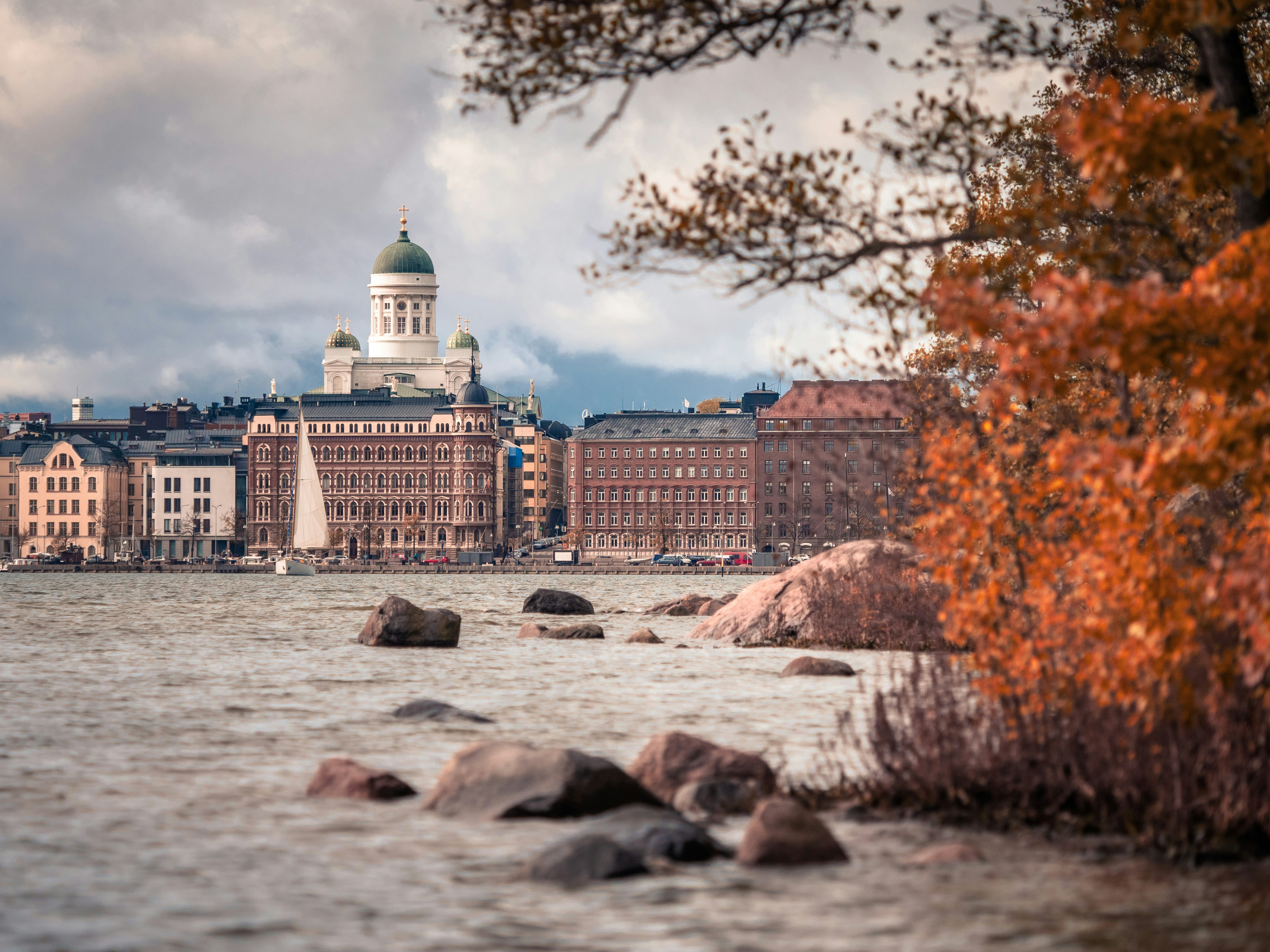 Photo by Unsplash An illustrative photo of a body of water with a large building in the background.