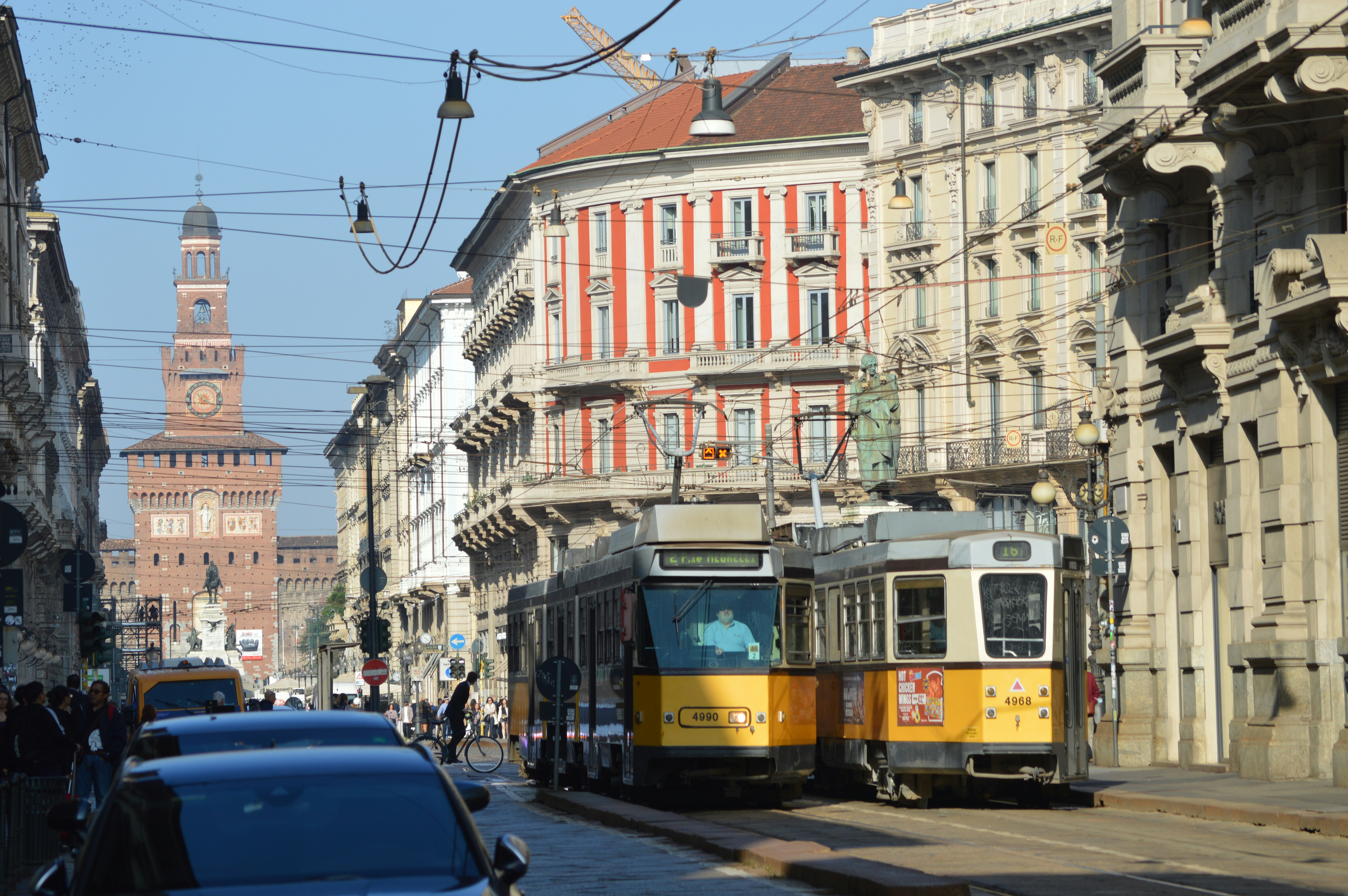 Photo by Unsplash An illustrative photo of a yellow and black tram on a city street.