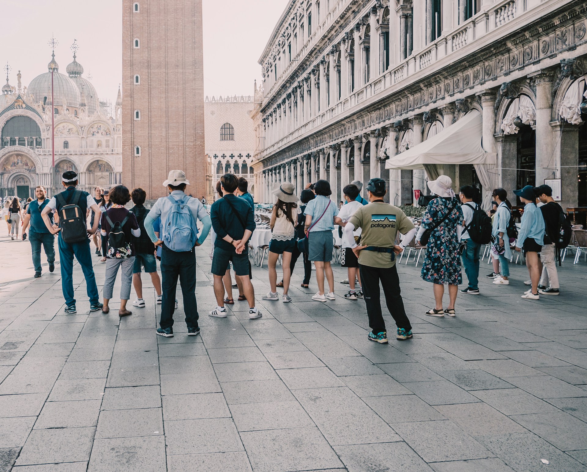 Photo by Unsplash An illustrative photo of Tourist group on Piazza San Marco (Venice, Italy)
