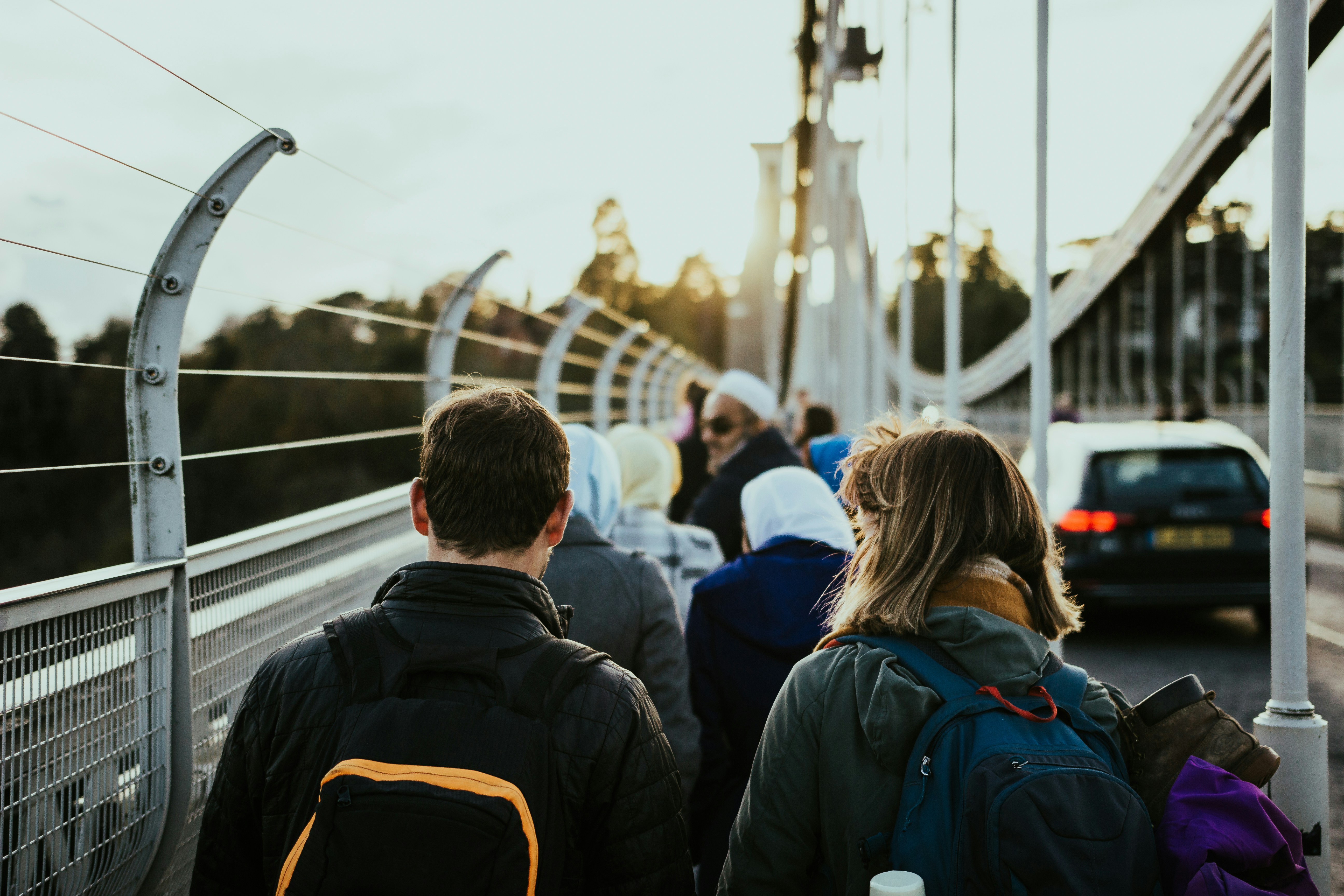 Photo by Unsplash An illustrative photo of a man in black jacket beside a woman.