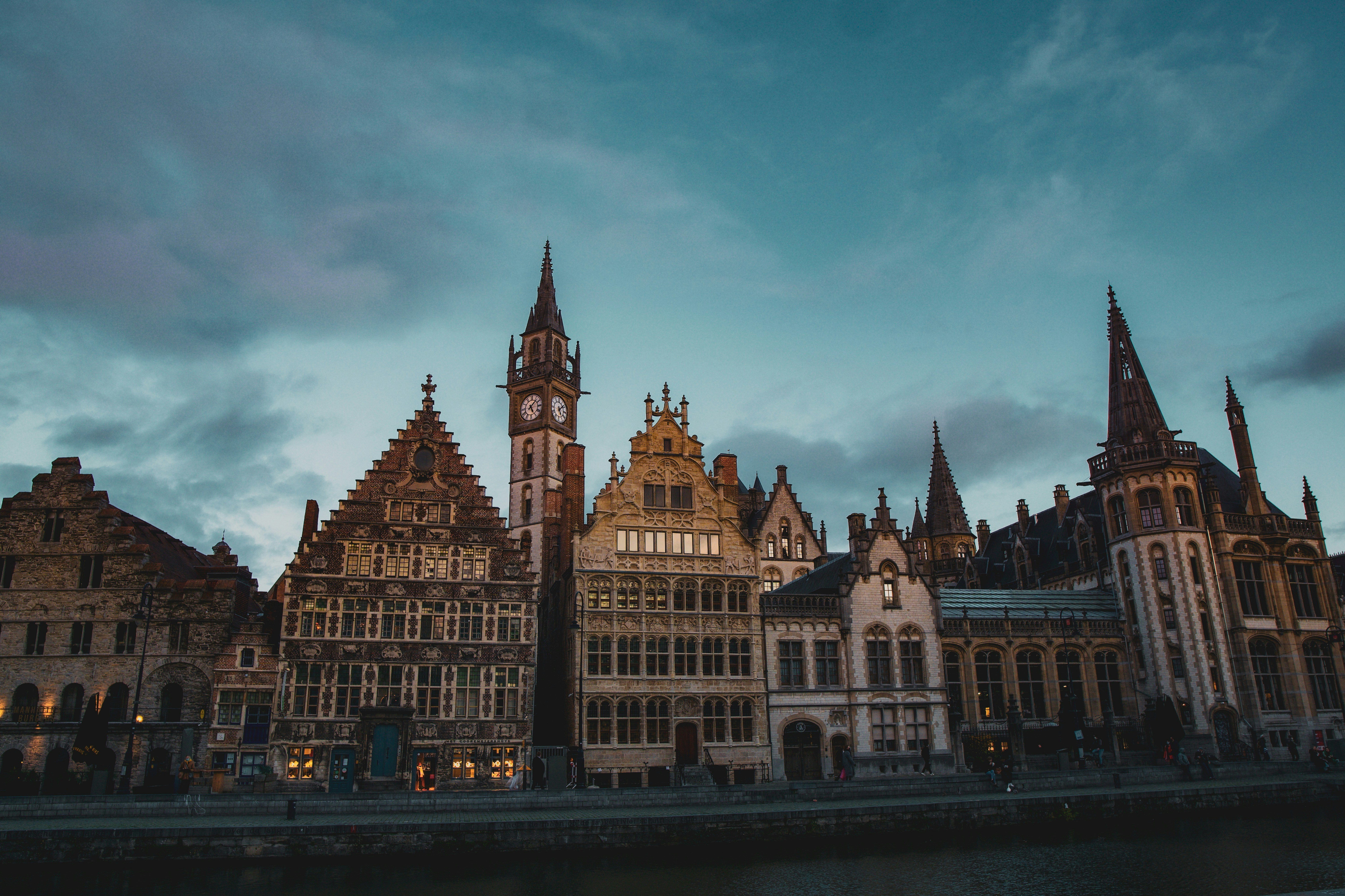 Photo by Unsplash An illustrative photo of brown buildings near a river.