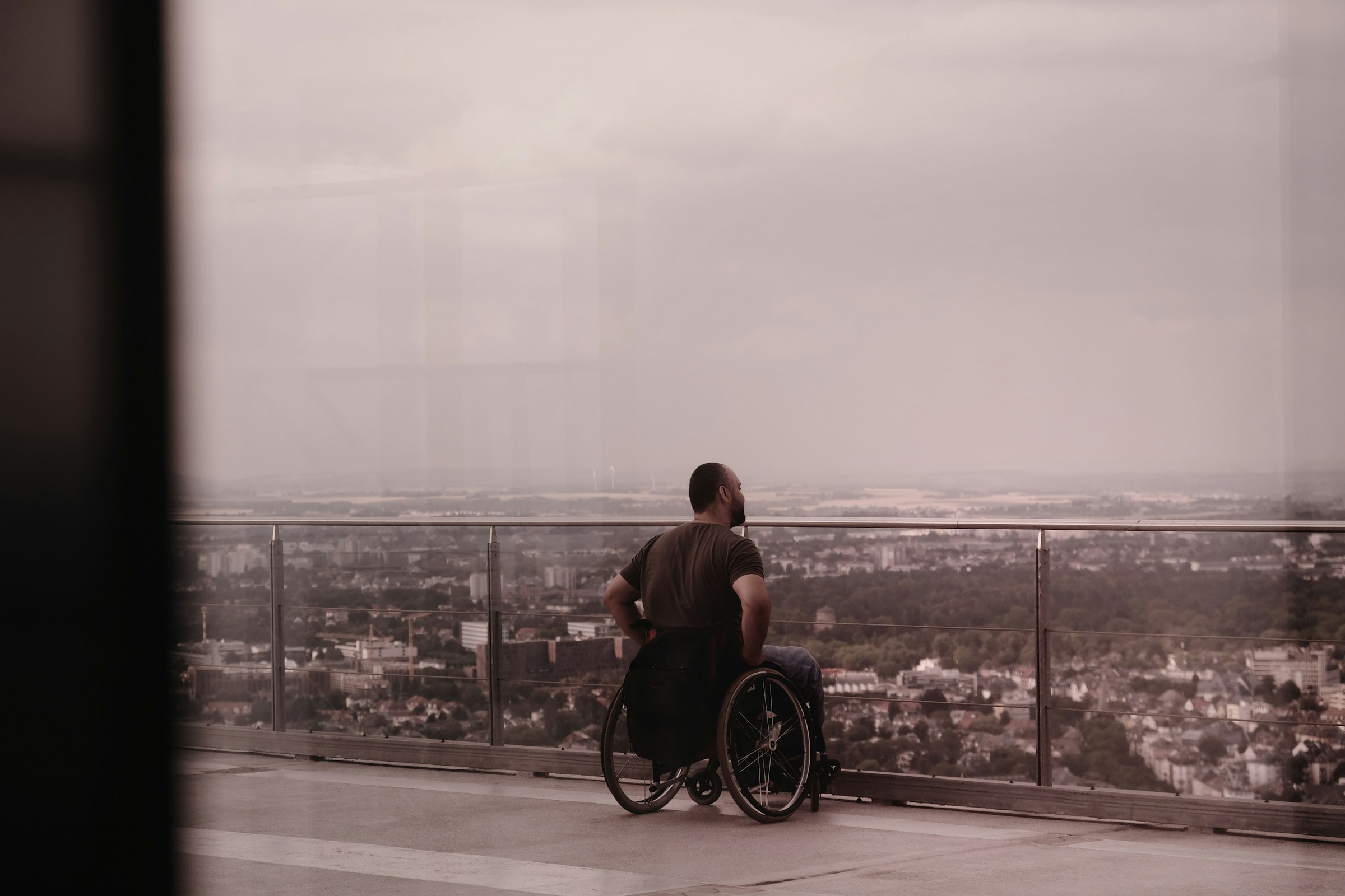 An illustrative photo of a person in a wheelchair.