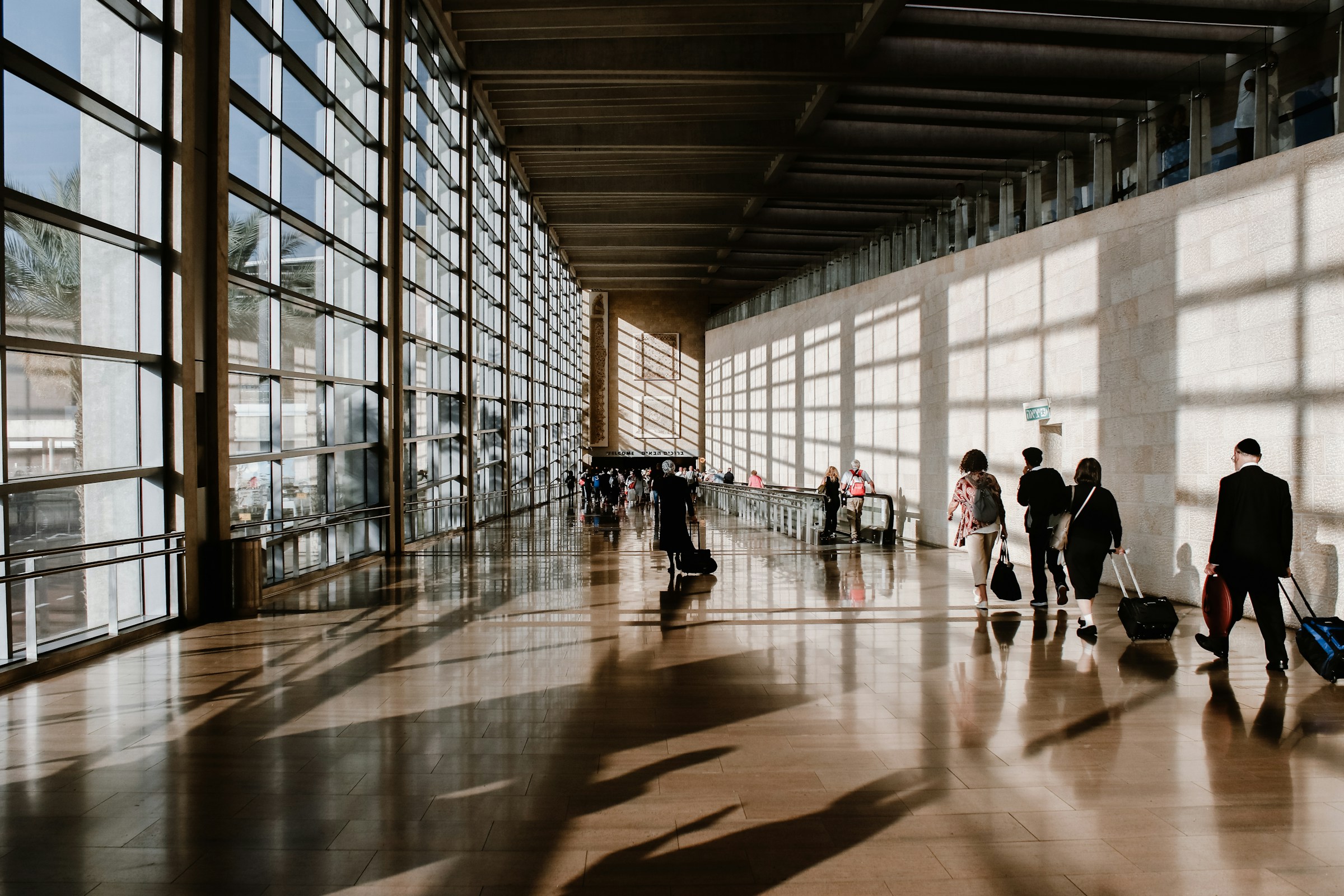 Photo by Unsplash An illustrative photo of a group of people walking.