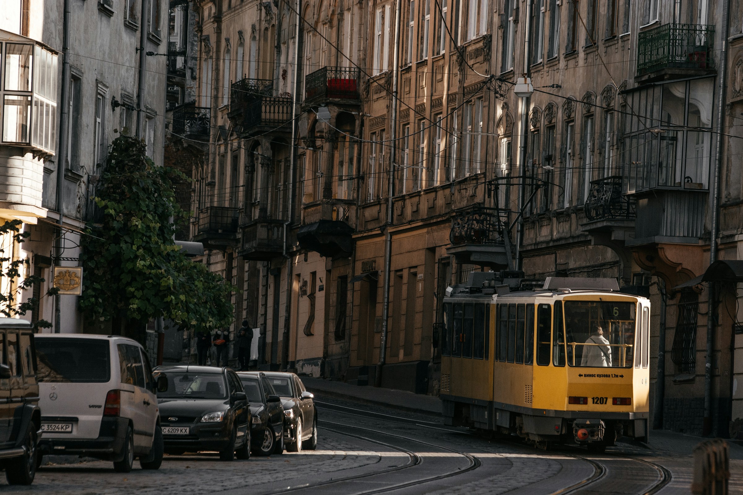 Photo by Unsplash An illustrative photo of a yellow train on the street.