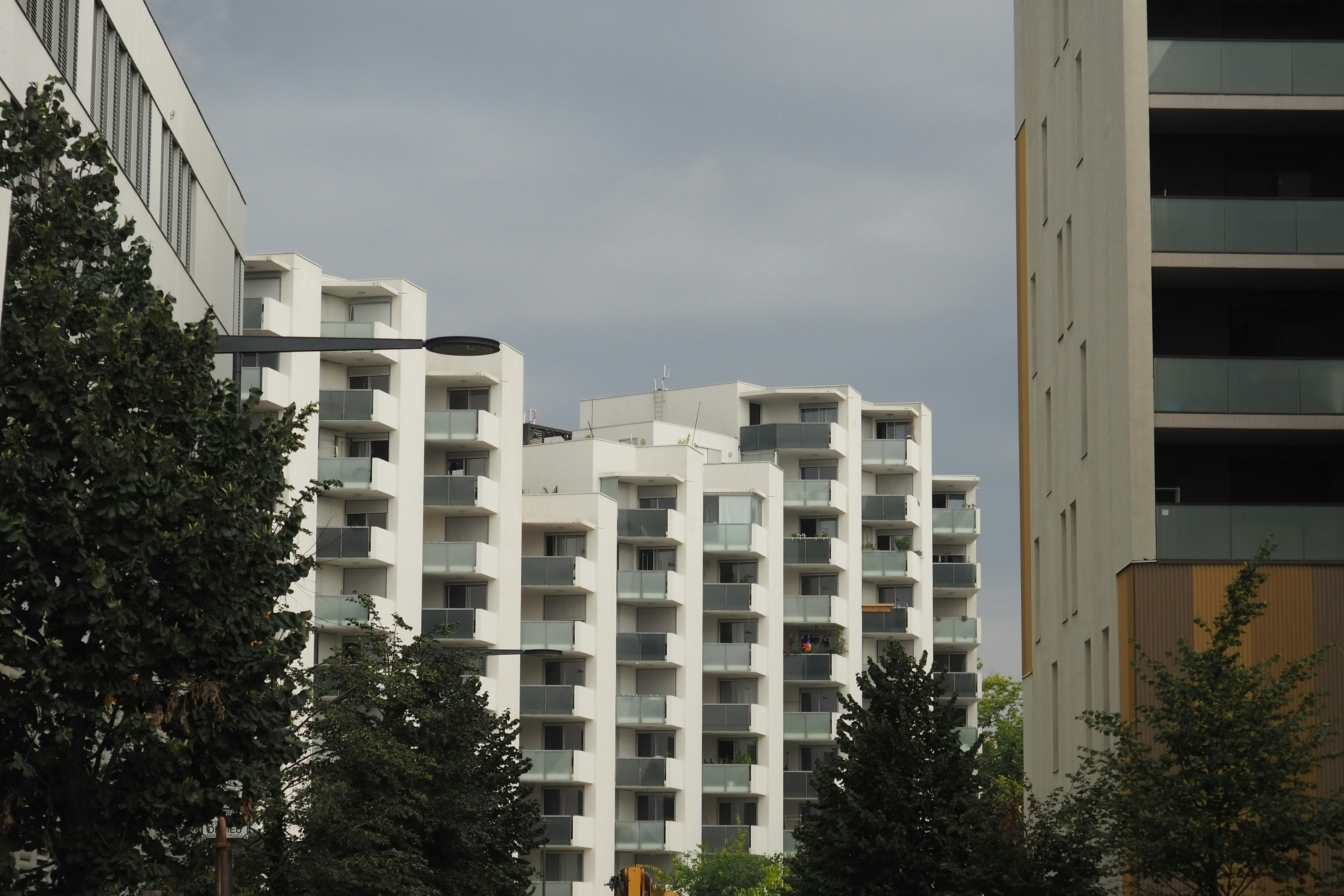 Photo by Unsplash An illustrative photo of a couple of tall buildings.
