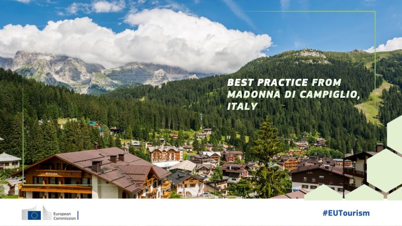 Photo by Sustainable EU Tourism project An illustrative photo of mountains and buildings.