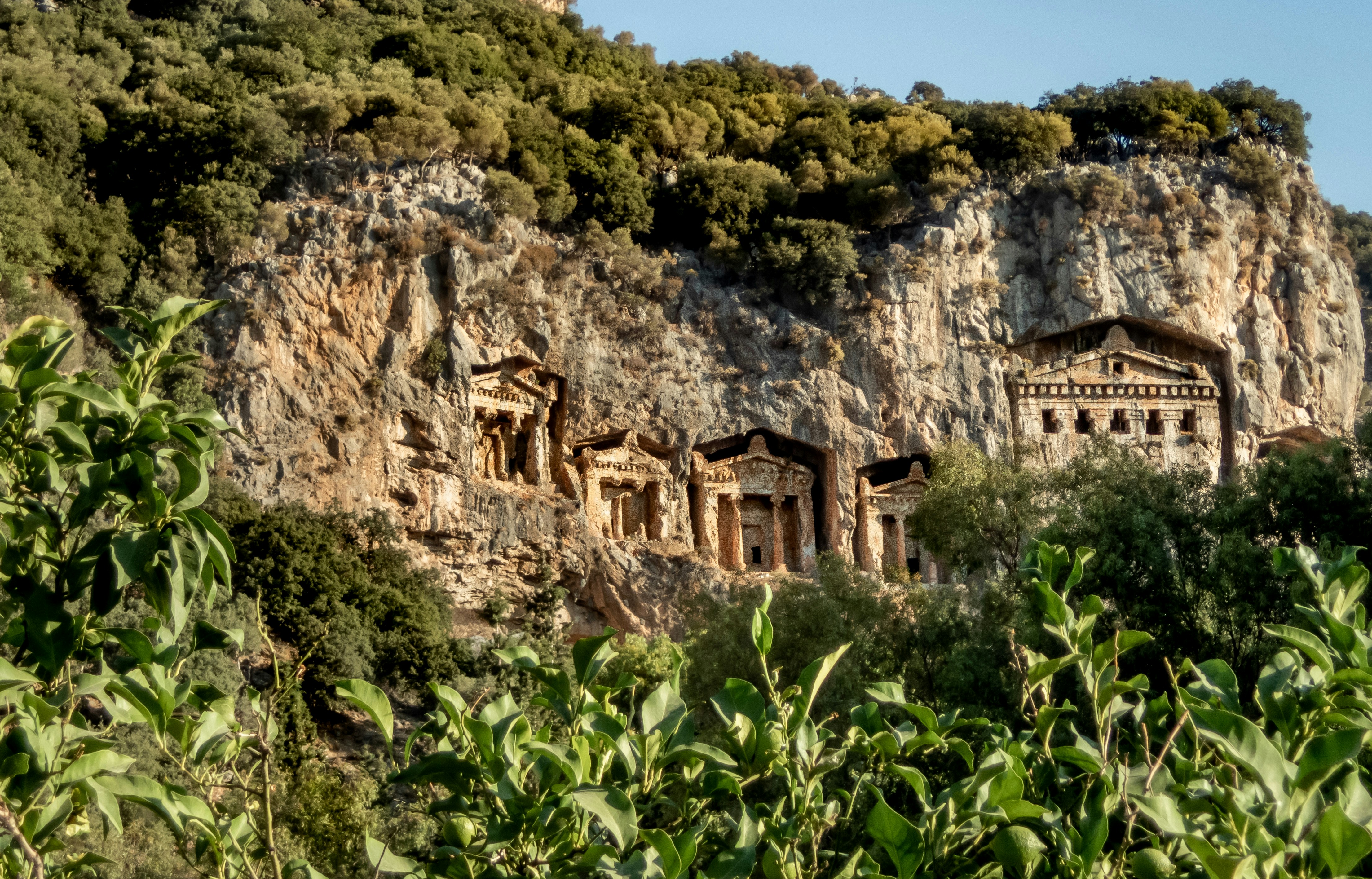 Photo by Unsplash An illustrative photo of statues carved in a mountain.