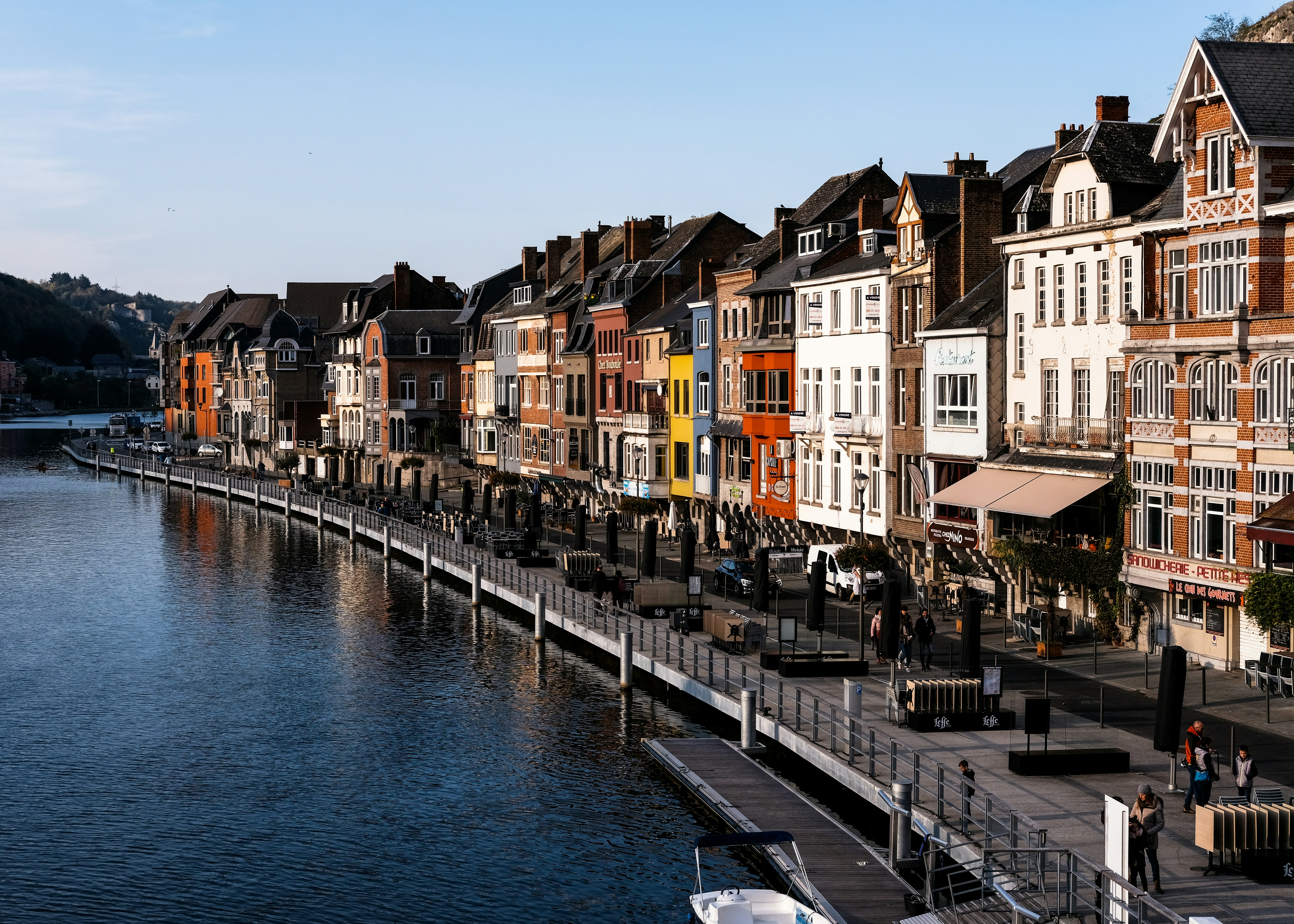 Photo by Unsplash An illustrative photo of buildings near a body of water.