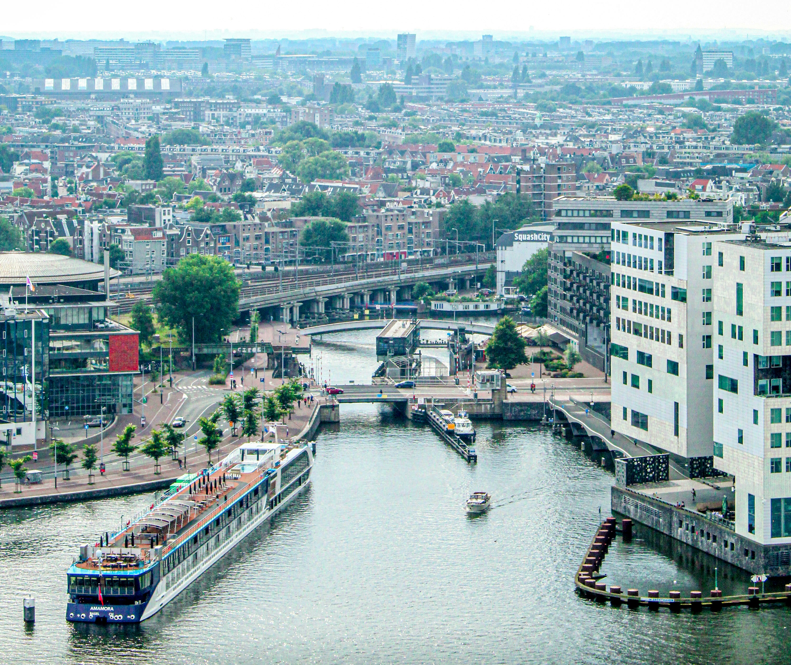 An illustrative photo of a river running through a city.