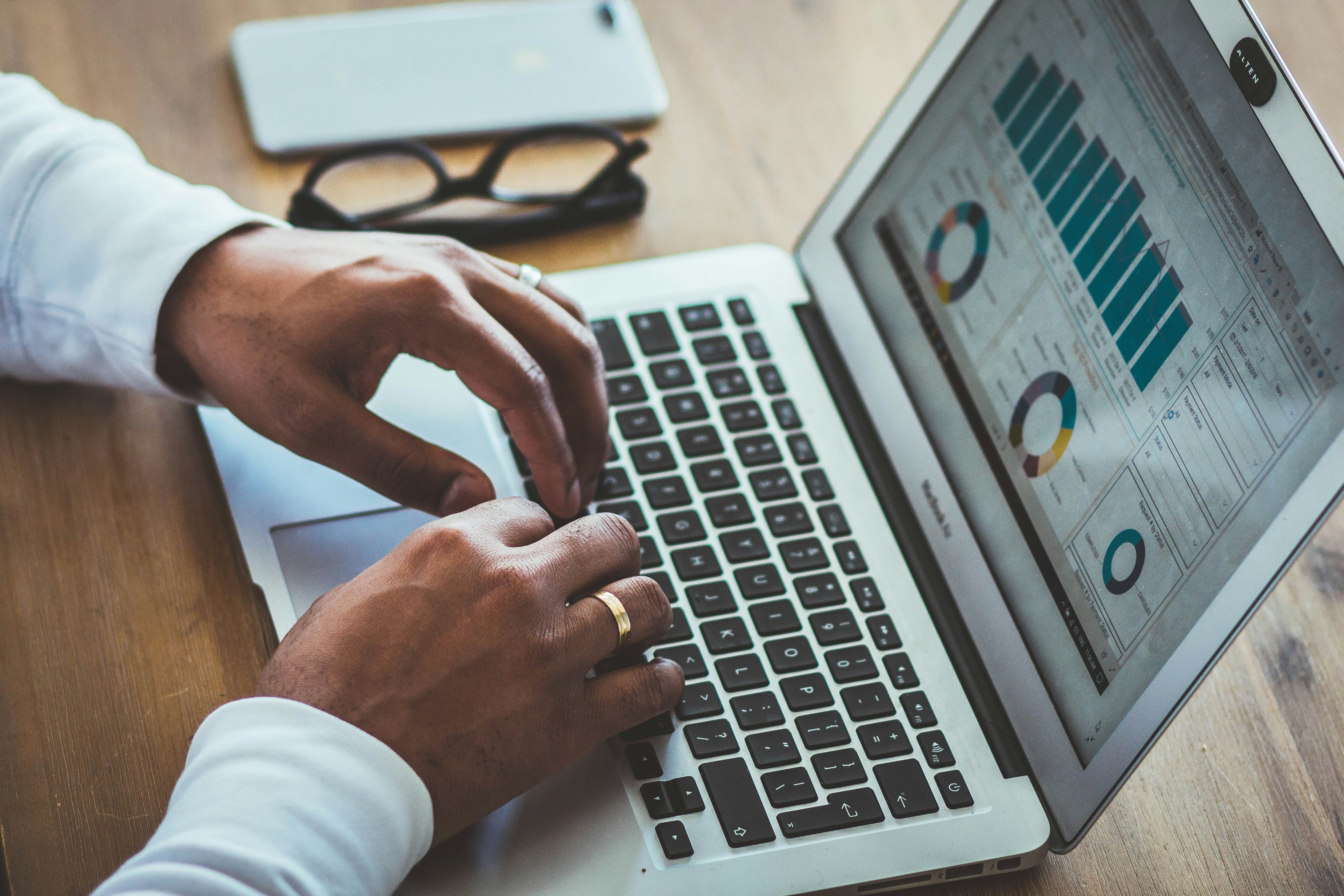 Photo by Unsplash An illustrative photo of a person using a laptop.