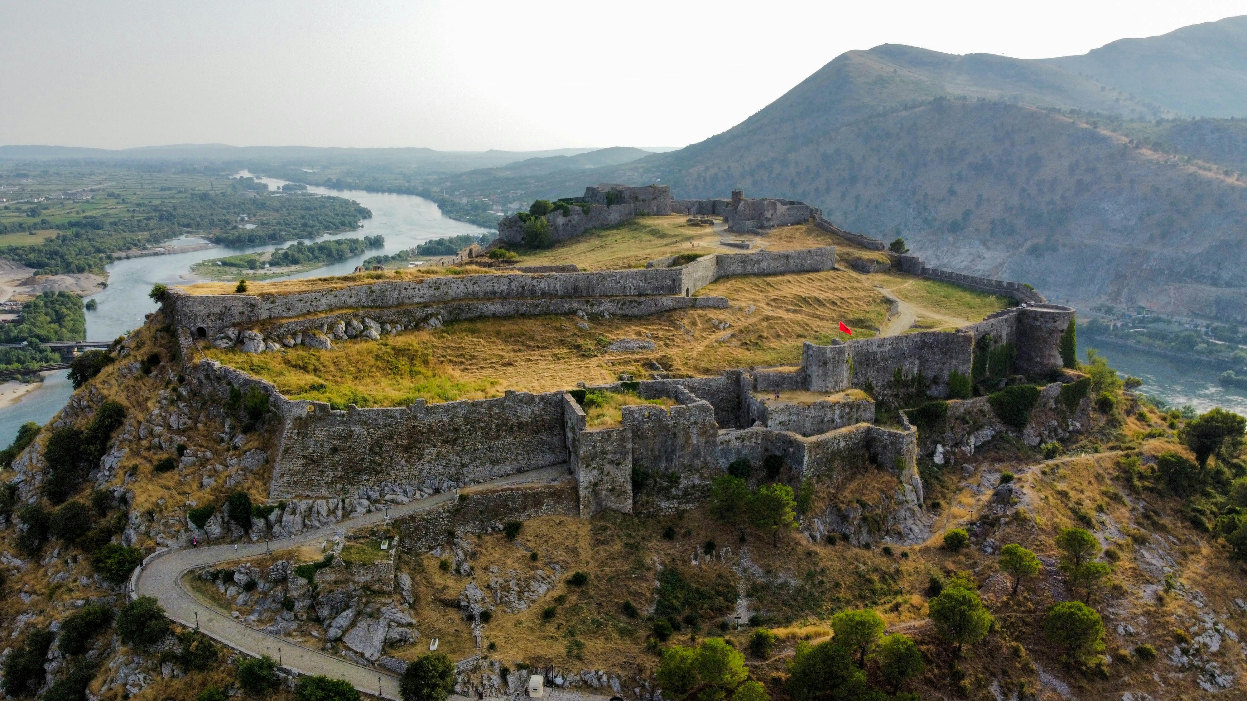 Photo by Unsplash An illustrative photo of a brown and green mountain.