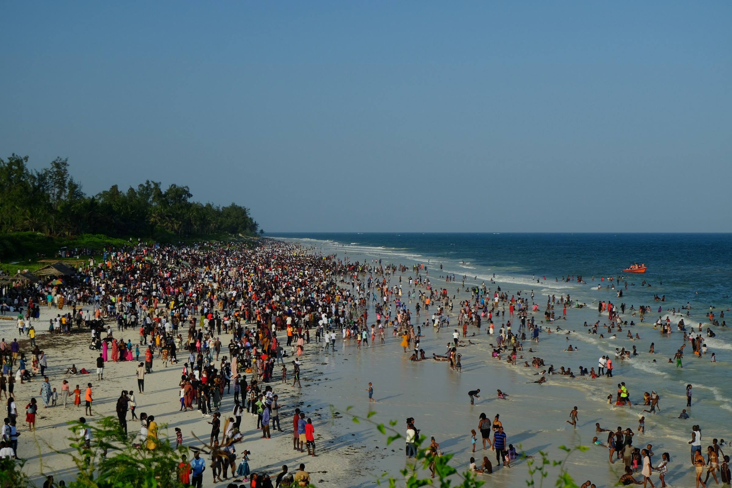An illustrative photo of a crowded beach.