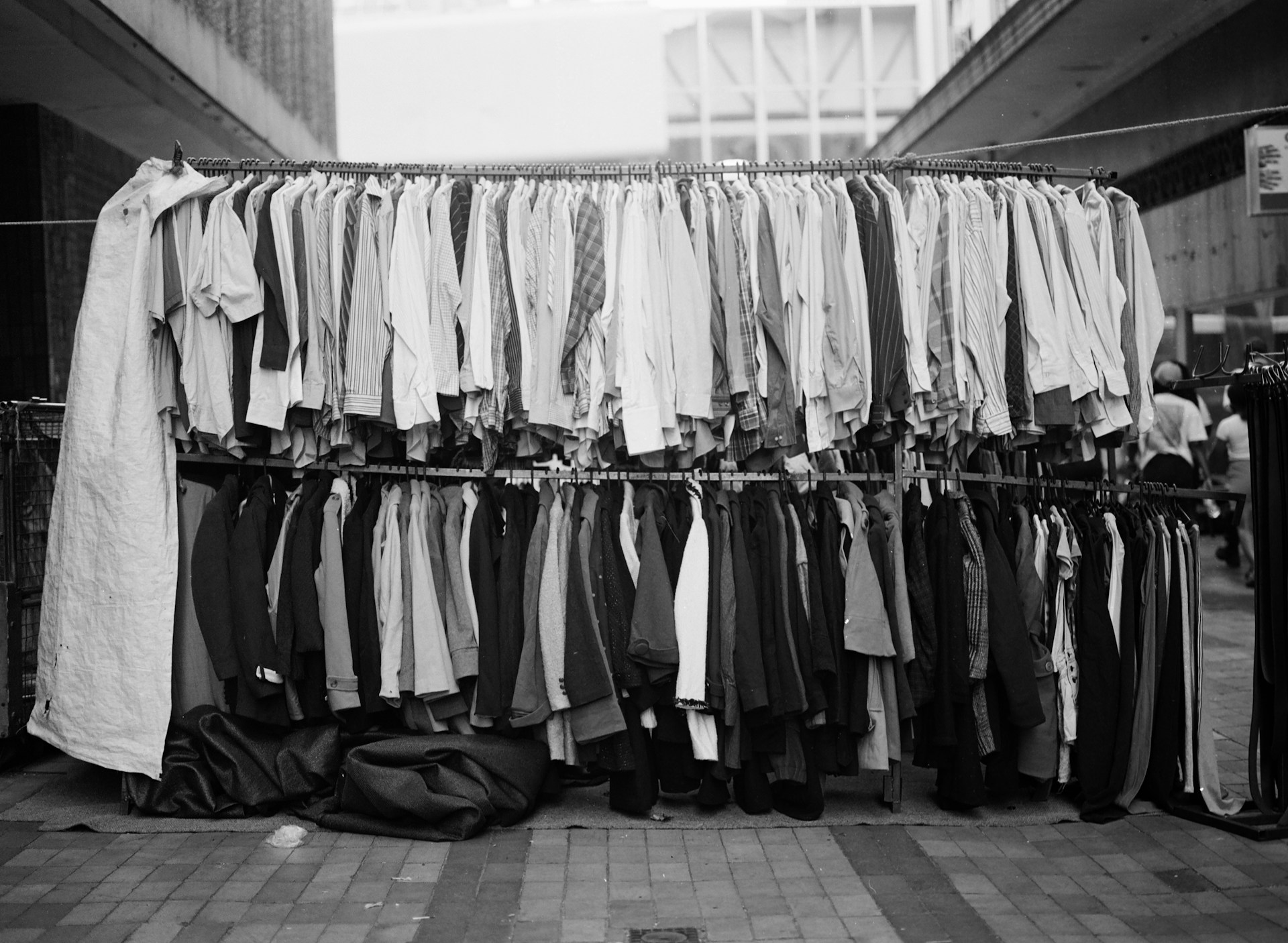 Clothes hanging on a clothes line. Black and white photograph of clothes hanging on a clothes line.