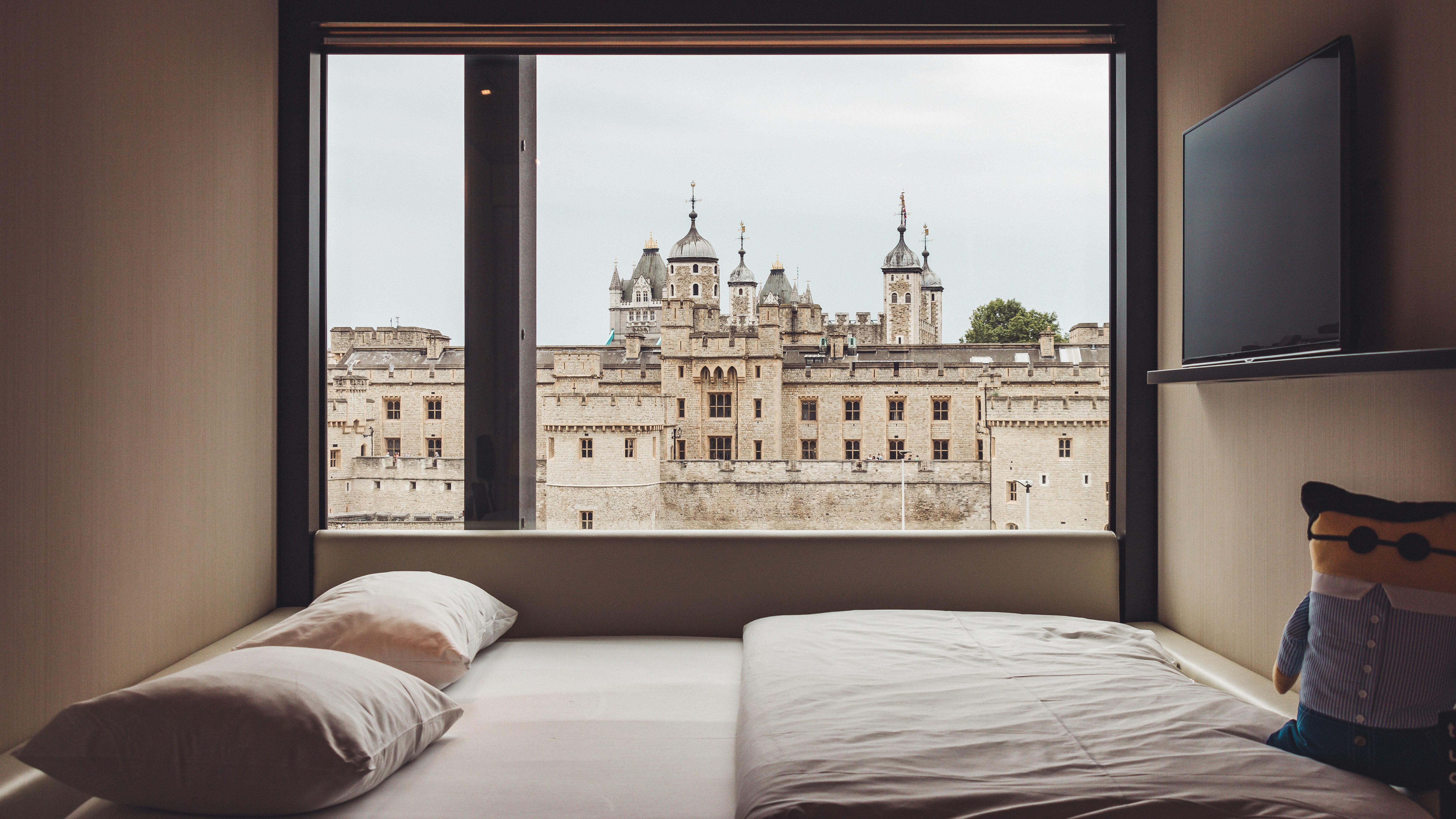 Photo by Unsplash An illustrative photo of a white mattress and two pillows.
